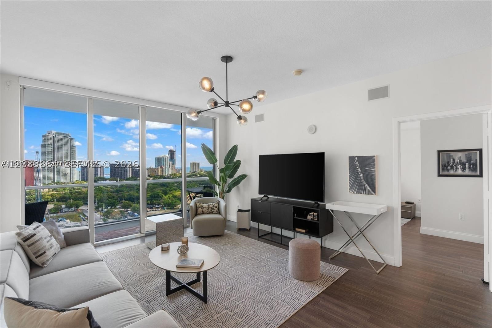 Beautiful Unobstructed City and Water views from this Stylishly Furnished High floor 2BD/2BA. Huge Balcony overlooking the City, Ocean and Simpson Park. Great split floor plan. Roller shades and blackout curtains throughout, upgraded light fixtures. Stainless steel appliances, granite counter tops, floor to ceiling windows. New AC. Residents of North and South towers share the amenities at Axis on Brickell. They include a sauna, hot tub, a barbecue grill, lap and resort-style pools, a state-of-the-art fitness center, poolside cabanas, a media room, clubrooms with billiards tables and kitchens, a business center, and a steam room. Additionally, Axis on Brickell offers concierge and valet parking services. Rental Policy - 30 days minimum, 12 times a year. One parking assigned, parking #7155