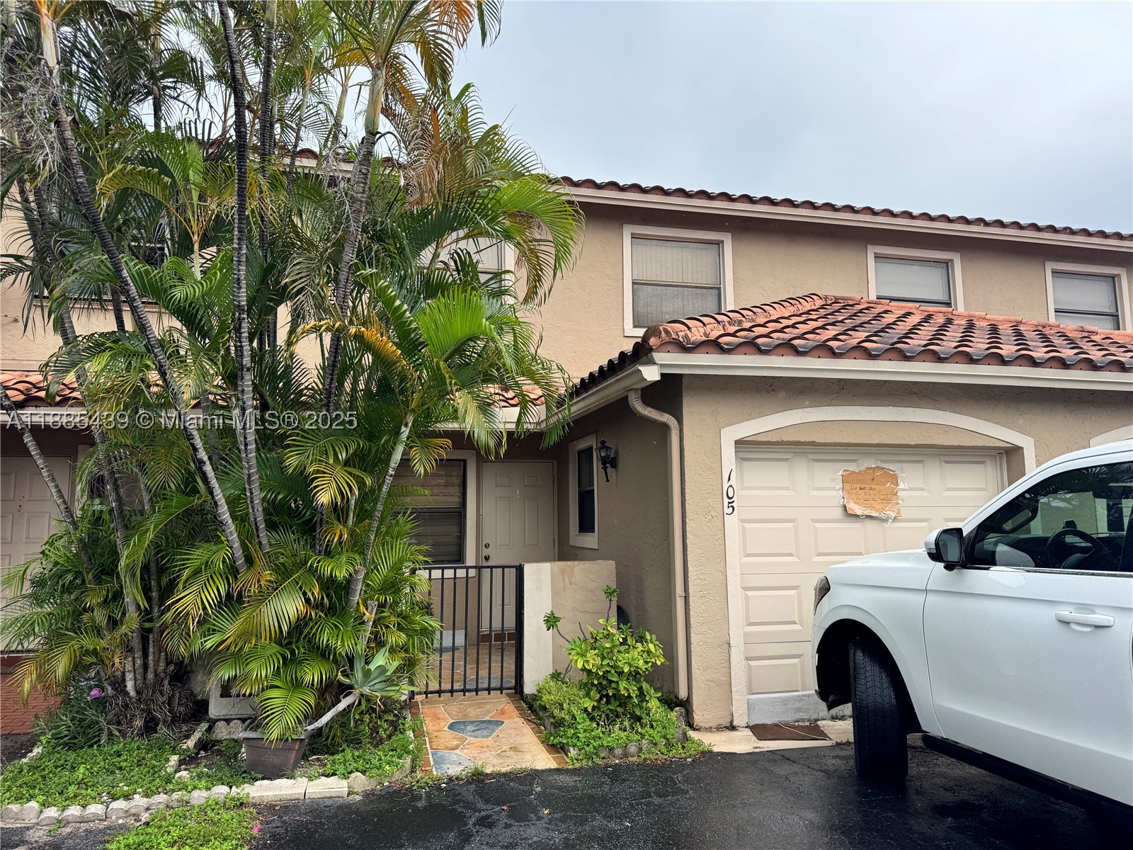 Rarely available 3BR/2.5BA lakefront townhouse in the desirable Lago Grande community, perfectly situated near the front gate for added convenience. Enjoy the ease of two assigned parking spaces right in front of the unit plus an additional space in the 1-car garage. This well-maintained home has been tastefully updated over the years, featuring a new A/C (2019), updated kitchen with sleek cabinets and granite countertops (2019), and fresh luxury vinyl plank flooring on the second floor and stairs (2024). With its spacious layout, serene lake views, and modern upgrades, this home offers the perfect blend of comfort and style in a sought-after neighborhood.