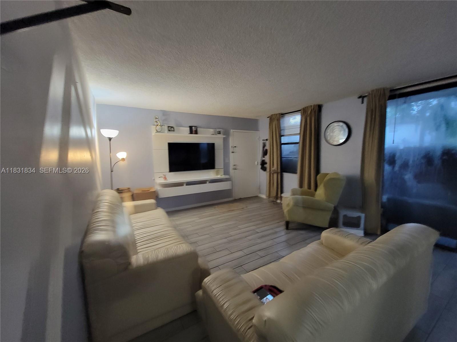 ATTENTION PRICE DROPPED !!!!!INVESTOR OPORTUNITY, NO RENTAL RESTRICTION CAN BE RENTED SINCE DAY 1, CENTRALLY LOCATED CONDO 2 BEDROOMS, 2 FULL BATHROOMS, FULL SIZE WASHER AND DRYER IN THE UNIT, TILE THROUGHOUT, LOCATED ON THE FIRST FLOOR, CLOSE TO SUNRISE BLVD AND OAKLAND PARK BLVD, 441 AND TURNPIKE, TREE GARDEN CONDO LAUDERHILL. CENTRAL AC, NO AGE RESTRICTIONS. WATER AND GARBAGE INCLUDED. ONE PARKING PLUS GUESS PARKING, WORKING TRUCKS AND VANS ALLOW, FAST APPROVAL, PETS ALLOW, LESS THAN 20 POUNDS NO SPECIAL ASSESTMENT. TENANT OCCUPIED TILL MARCH 31, 2027. RENTED FOR $1800. SHOWING BY APPOINTMENT ONLY