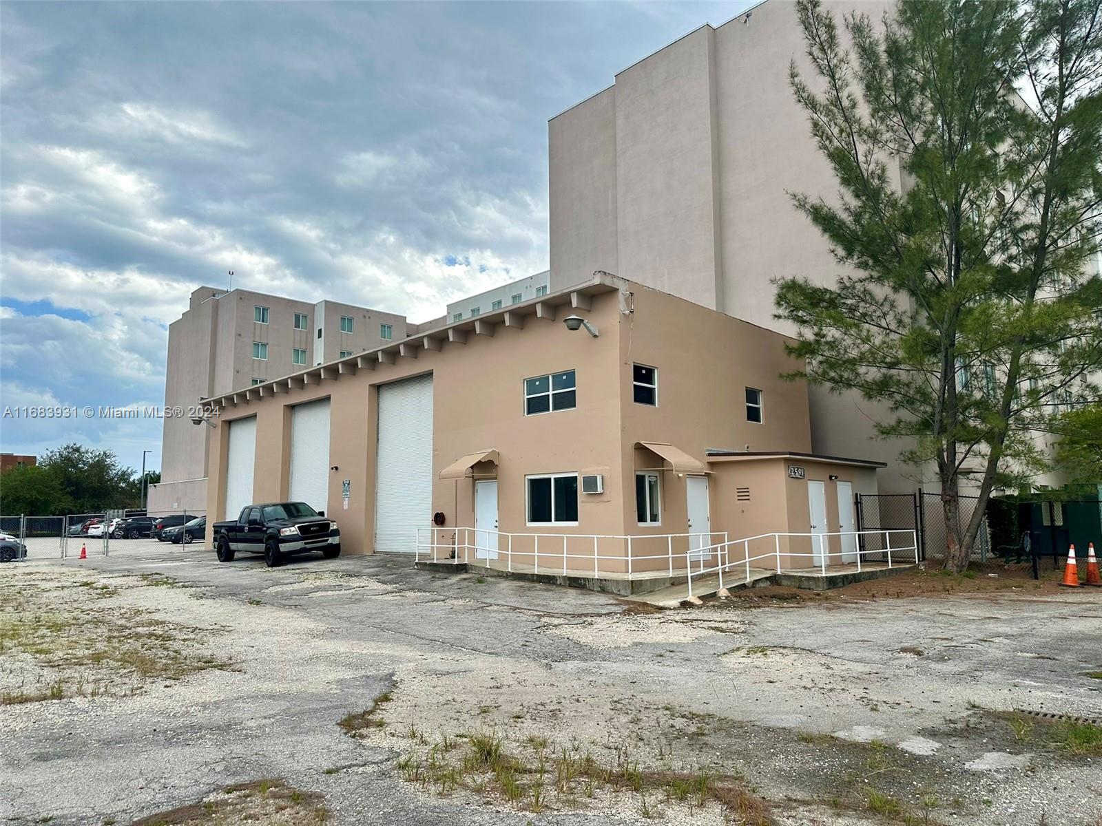 Incredible opportunity to purchase this lakefront property facing Palmer Lake near Miami International Airport.

The property features a warehouse with 2,502 SF of building with three 10' by 14' roll-up doors each.

The total land for this folio is 51,401 SF, from which 23,087 SF is dry land and 28,314 SF is riparian land. This property falls in the zoning for the Palmer Lake Metropolitan Urban Center District. The density to develop on this property is based on the total land area of 51,401 SF, which means potential for a mixed-use project.