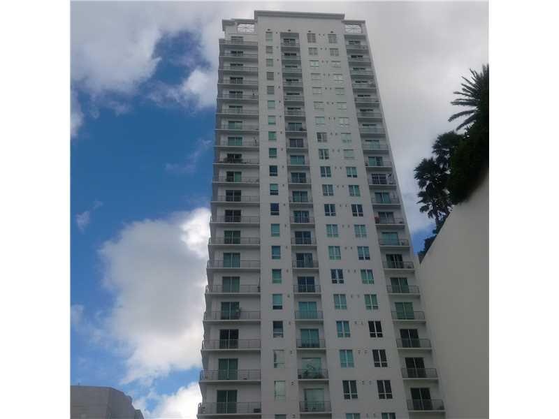 Live in Trendy Downtown Miami, 1 block from Bayside. Large loft apt with concrete floors, floor to ceiling impact glass doors with views of the Metrorail and Downtown. All new built in 2006. Modern décor with 12ft ceilings, Marble bathroom accents, stainless steel appliances, washer & dryer in the unit. Furniture for sale. Great for vacation rental. Steps from restaurants, bay front, theaters, etc. Urban living at it's best. Least expensive in the building. Estate sale. Bring an offer. Very motivated.