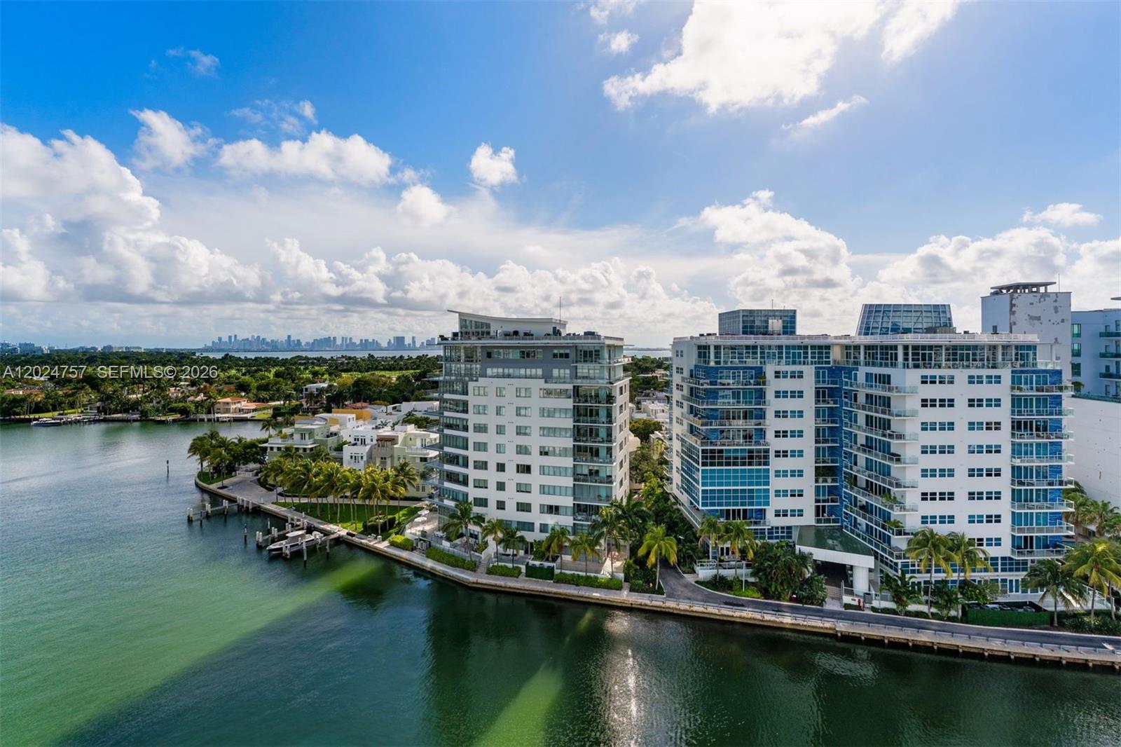 This stunning residence at 6000 Indian Creek #14B offers a front-row seat to breathtaking views of the Miami skyline and intracoastal. Immaculately maintained and in pristine condition, this 2-bedroom, 2.5-bathroom gem is the perfect blend of luxury, style, and serenity. Step inside to discover an open-concept living space flooded with natural light through floor-to-ceiling windows. The modern kitchen, complete with sleek cabinetry and high-end appliances, flows seamlessly into the dining and living areas—ideal for entertaining or simply soaking up those panoramic views.