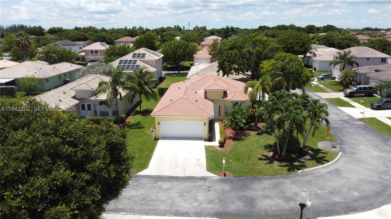 **REDUCED**Spacious 3BR/2BA corner home in desirable Keys Gate! This property can be sold fully furnished. This larger unit features a welcoming foyer, bay window in the living room, separate dining area, and a bright family room w/ sliding door. Kitchen offers white cabinets, pantry & glass door leading to a large, screened patio with a ceiling fan. Great for relaxing or entertaining. Bedrooms have wall-to-wall closets; the primary suite includes a walk-in closet & tray ceiling. Primary bath has double sinks, extended counter, shower, private toilet room & linen closet. Guest bath w/ tub/shower. Laundry room with washer, dryer, hot water heater, and shelves. 2-car garage w/ automatic doors. Laminate floors, ceiling fans & accordion shutters throughout.