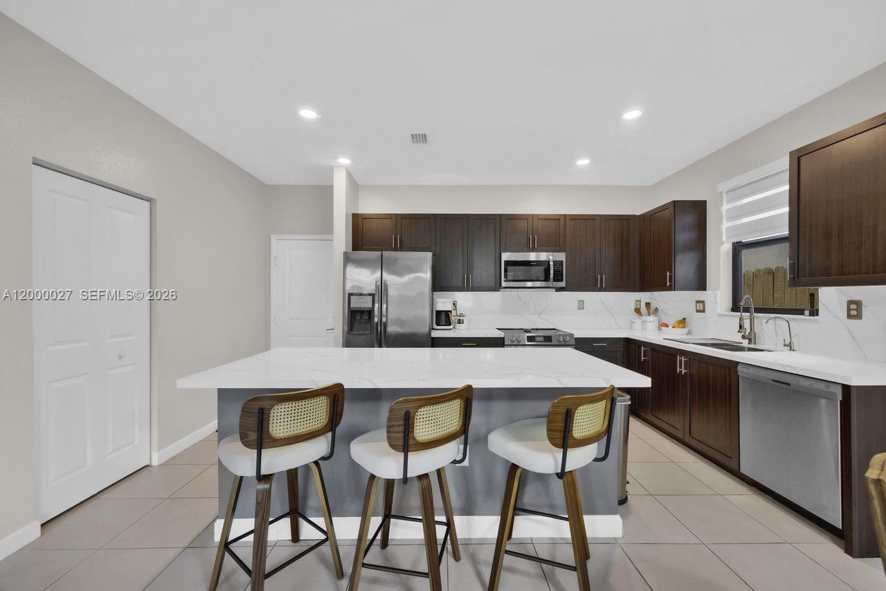 S ALLAPATTAH GARDENS - Residential