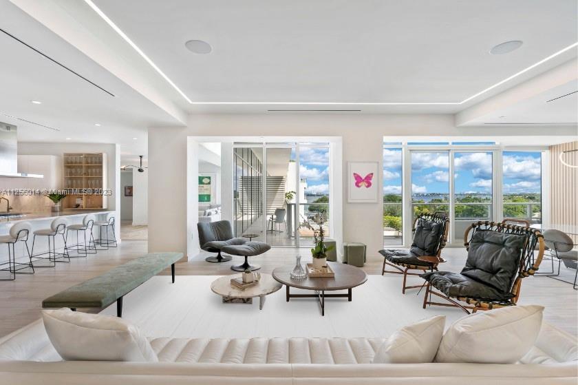 Step Inside With Me! Decked out in designer touches, this is one of the finest homes at the brand new Ritz Carlton Miami Beach. A private elevator leads you to this sophisticated 5 bedroom + playroom showroom-quality residence. Updates include custom Ornare millwork & closets, high end lighting, Calcutta marble counters, and marble flooring throughout. This ideal layout features a chef’s quality kitchen, formal dining room, spacious sitting area, TV room, a bonus den, and generous en-suite guest rooms. With East-to-West exposure, the Bay, Garden, & Downtown skyline views are impressive, as is the abundance of natural light. Relax outdoors from one of two terraces, including the L-shaped wraparound. Truly the best of the Ritz! A private boat slip is available for purchase asking $475,000.