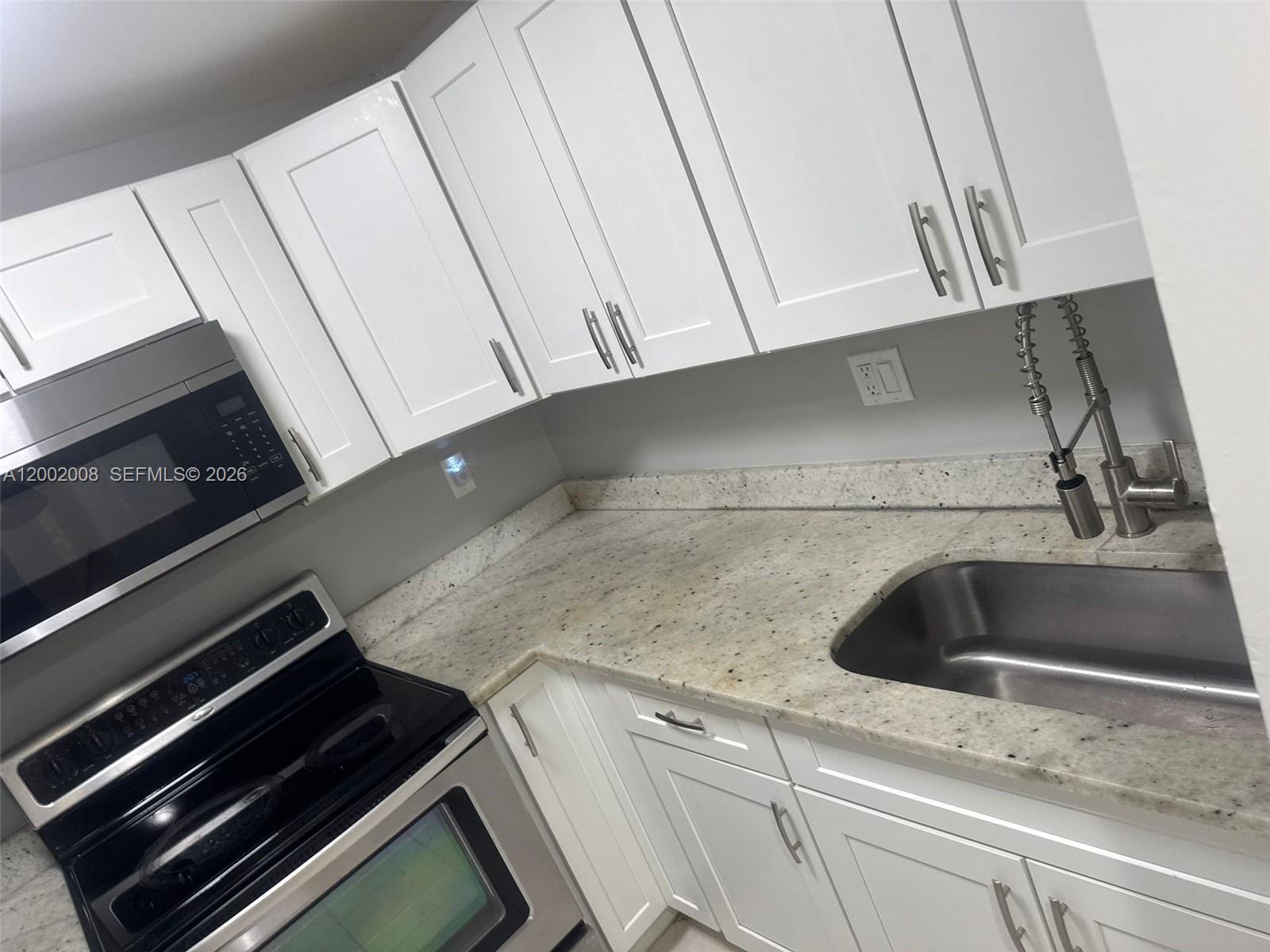 Move in ready 1st floor apartment in Lauderhill. 2/2 with tile throughout and full-sized washer and dryer. Small fenced outdoor space. Close to Schools and Highway.