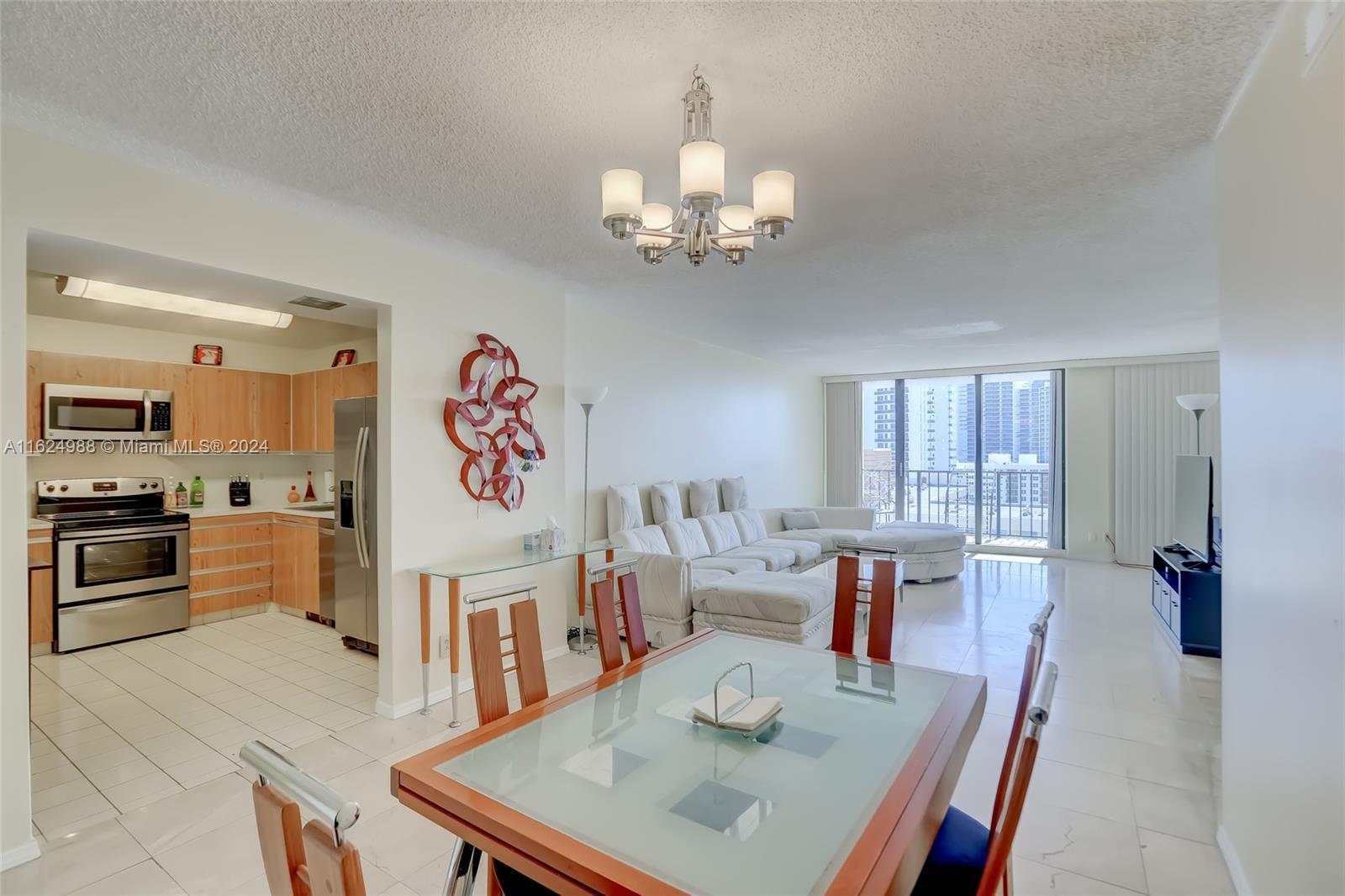 Looking for comfort and an affordable stay on Florida's ocean? Check out this stunning updated and fully furnished 2 bd/2 ba condo! With tile flooring throughout, updated bathrooms, and new stainless steel kitchen appliances, it's the perfect beach condo. intercoastal views create a serene atmosphere. The Quadomain complex offers resort-style living, with 24-7 security, beach service, valet parking, 2 swimming pools, 2 gyms, a restaurant, and more. With very few condos like this in this price range, this is truly a unique and special place to call home.