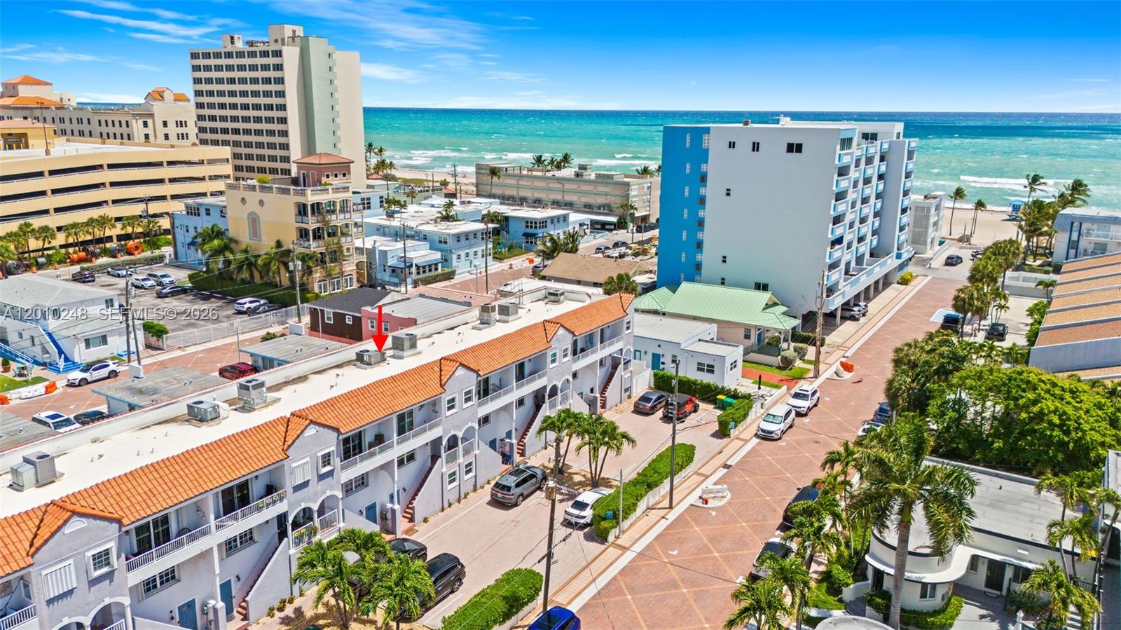 Not a condo. Not a compromise. This three-story townhome sits in the heart of one of South Florida's most storied and sought-after neighborhoods — the Hollywood Beach Broadwalk corridor — where walkable streets, ocean breezes, and an iconic waterfront promenade define the lifestyle.
Located between the Broadwalk and the Intracoastal, the home is steps from newly paved Virginia Street, your private pathway to the sand. Three thoughtfully designed levels give you space to live the way you choose — and the flexibility to earn while you're at it.
The main living level greets you with an open, sun-filled layout with generous room to make it your own. Upstairs, the primary suite is joined by two additional rooms and a balcony with peeks of the ocean — a reminder of exactly where you are.
What truly sets this property apart is the ground-level suite with its own separate entrance — a self-contained space that opens the door to genuine income potential. Short-term rentals are permitted with restrictions, meaning you can occupy the main home, lease the lower level, or rent the entire property depending on your goals.
In a neighborhood dominated by condos, this is the rare find that gives you ownership without the compromise. Offered at an exceptional entry-point price for Hollywood Beach, opportunities like this don't last. Your own slice of Hollywood Beach, with the upside to match.