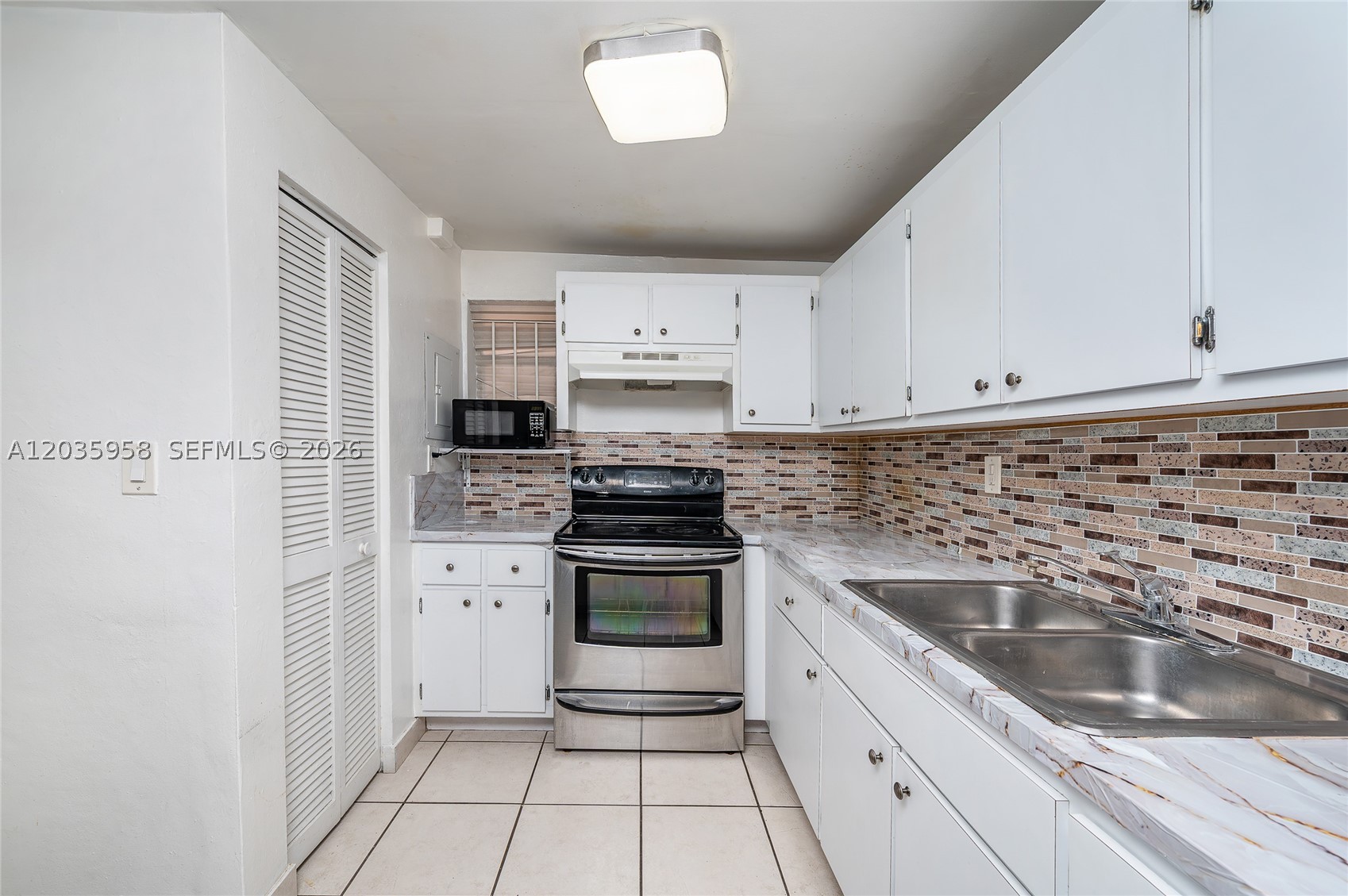 PALM-WEST GARDENS CONDO - Residential
