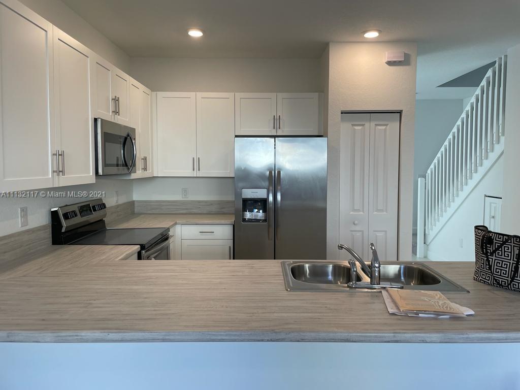 Brand New 3 Bedroom Villa! This property is the CORTEZ model, one of the most desirable floor plans in the community. This villa is very spacious with high ceilings and lots of natural light. It has living room and family room next to the kitchen. This property will rent fast! This villa has a stainless steel appliance package, and smart home tech that you will truly enjoy! The property also have a private patio, which is great for entertaining.