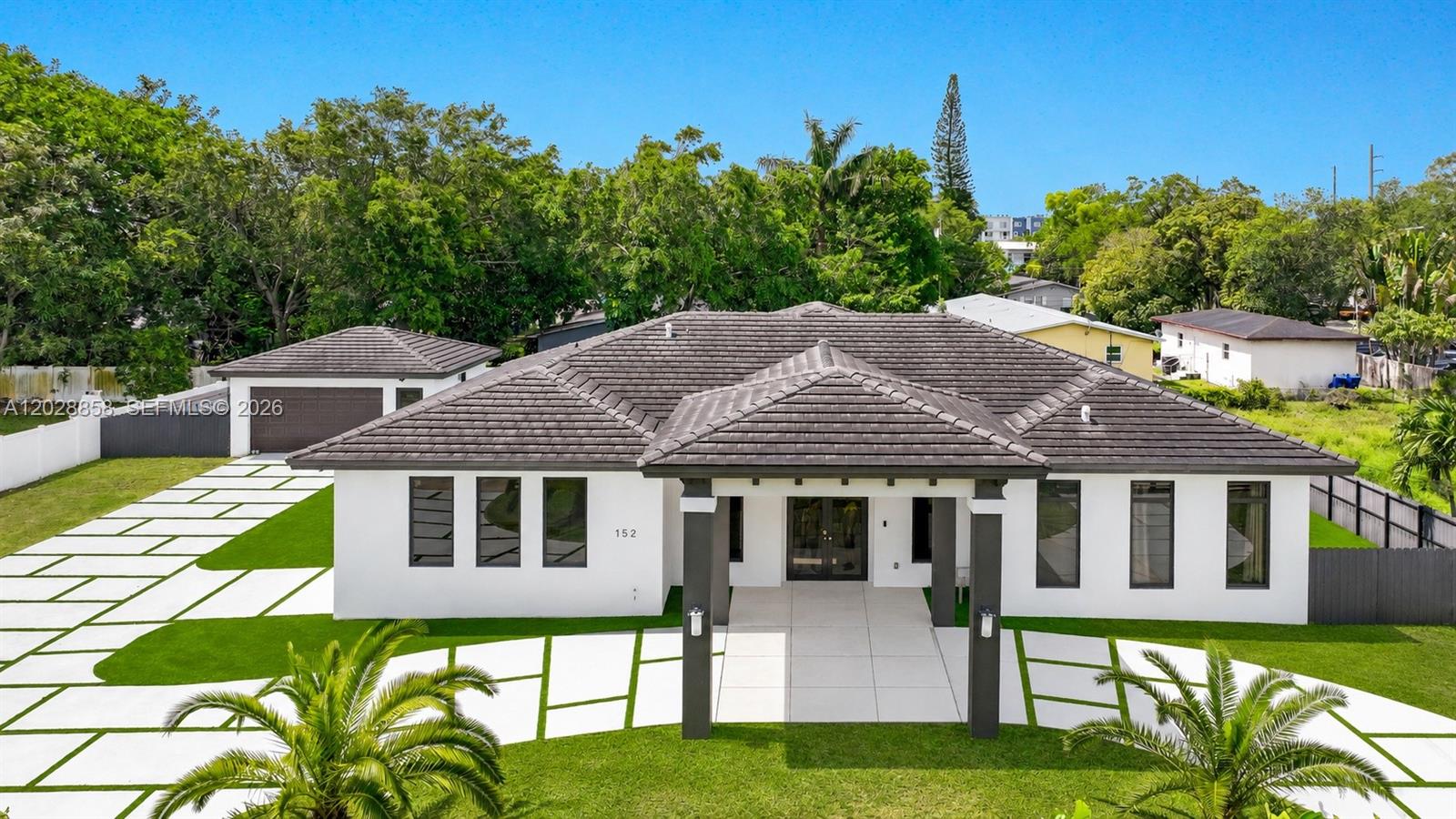 Stunning 2023-built 4-bedroom, 4-bath home with 3,989 adjusted sq ft on an oversized 18,627 sq ft lot in a convenient Miami location with NO HOA. This property offers the space, flexibility, and lifestyle features buyers are looking for, including a beautiful swimming pool, expansive outdoor areas, and ample room for a boat, RV, and additional vehicles.  A major highlight is the detached 2-car garage, which offers excellent potential for a guest suite, in-law quarters, home office, gym, art studio, or photo studio. The spacious layout is ideal for both everyday living and entertaining. Well located near I-95 with quick access throughout Miami and approximately 15 minutes from the beach. Rare opportunity to own a newer home with a large lot, versatile spaces, and plenty of room to enjoy, expand, and personalize.