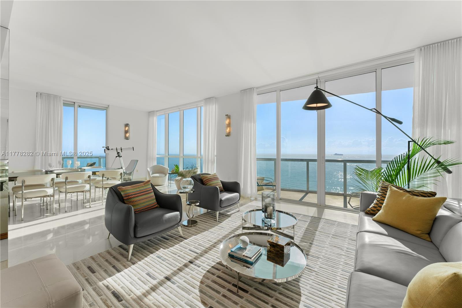 Oceanfront residence offering breathtaking, unobstructed views of the Atlantic from every room. The spacious, flow-through design is highlighted by floor-to-ceiling windows that allow natural light to fill the home, creating a bright & airy atmosphere. With 3 beds plus den, this residence offers generous living space & versatility. The open living & dining areas extend seamlessly to a large terrace, offering the perfect backdrop for coastal living. Continuum is set within 12 acres of pristine oceanfront grounds, providing access to a private beach club, two pools, tennis courts, on-site dining, spa, & a state-of-the-art fitness center. With 24-hour concierge & valet services, this is a rare opportunity to enjoy luxurious beachfront living in one of Miami Beach’s most exclusive communities.