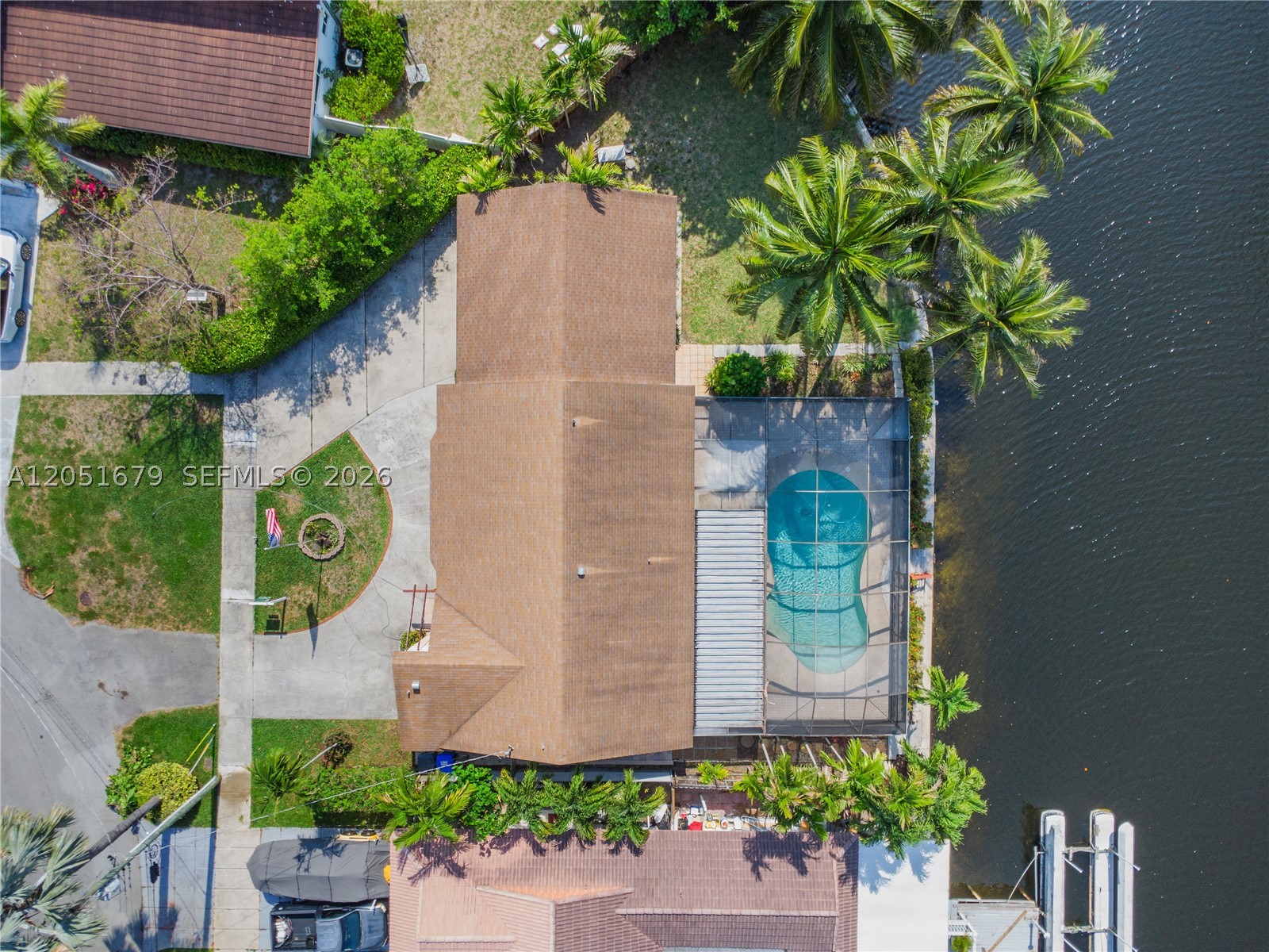 18,017 Sq.Ft. Oversized Lot, Canal-Front Home with Ocean Access & Just "1" Fixed 8-Ft Bridge To The
 Dania Cutoff Pass.
 Exceptional Opportunity, 3 BD, 2BA., Single Family, One Level Floor Plan Featuring Soaring Ceilings, Eat-In Kitchen,
 Spacious Living Area, Generous Closets, Huge Over-Sized Garage, Screened Patio and Pool Overlooking A Canal.
 Roof 2017, A/C 2025, Water Heater 2026, New Dryer 2026, New Irrigation Pump, Seawall Report, Wind Mitigation 
 Report. NO HOA, NO RESTRICTIONS, Large Grassy Front and Back Yard, One Block To Oakridge School.
 DON'T MISS THIS OPPORTUNITY..."CALL ME FIRST"