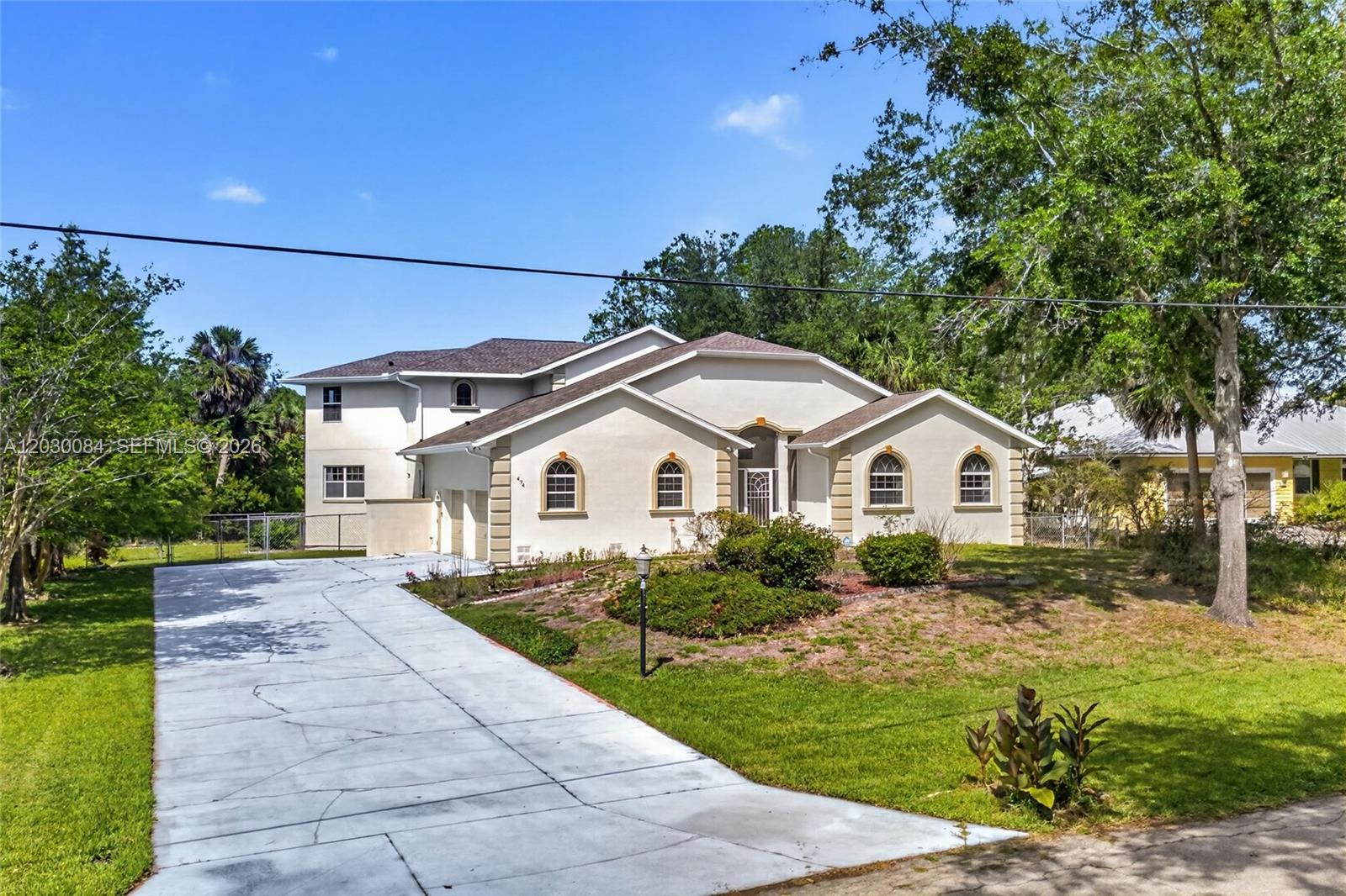 Discover an exceptional opportunity to own a home right on the Plantation Resort on Crystal River Golf Course, a championship golf course in the relaxed charm of Florida’s Nature Coast. Set on approximately 0.74 acres, this expansive custom residence offers more than 4,100 square feet of thoughtfully designed living space. Entering into a two-storied great room with a grand staircase,  with four spacious bedrooms, including a separate guest suite, 4.5 bathrooms, generous gathering areas, and a 2-car garage, the home is perfectly suited for entertaining, multi-generational living. Large windows bring in abundant natural light. At the edge of the home - beyond the inviting pool, is the view of the golf course, and a scenic pond. Included with the home is an additional pond-front lot that may potentially be separated and independently developed, subject to Citrus County approval. A standout feature is the private guest suite with its own entrance. The guest suite has its own living room and partial kitchen as well as bedroom. Located within a golf course community, surrounded by mature landscaping, scenic pond views, and peaceful outdoor spaces, the property offers a serene retreat while remaining just minutes from Crystal River’s famous springs, boating, fishing, waterfront dining, shopping, and Gulf access. Whether you are searching for a luxury primary residence or a multi-generational estate, this home is a rare find in one of Florida’s most sought-after coastal destinations