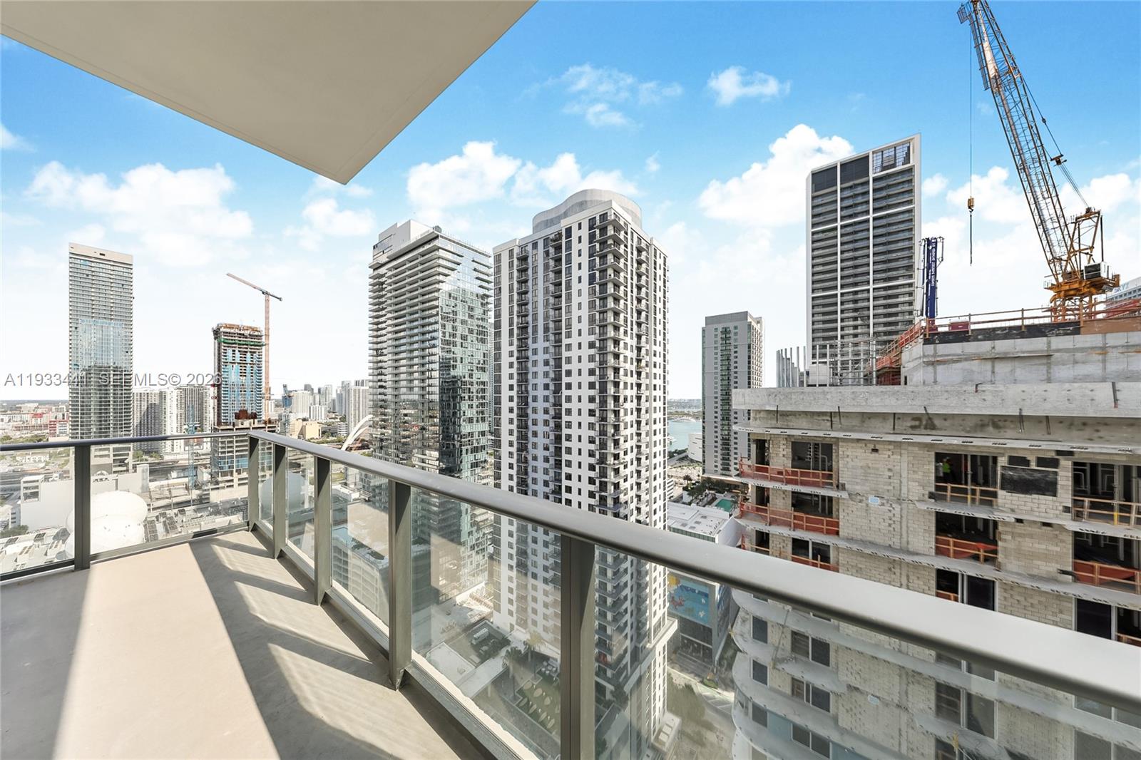 Introducing a newly delivered two-bedroom, two-bathroom corner residence at The Crosby in Miami Worldcenter, designed for upscale urban living in the center of Downtown Miami. Thoughtfully appointed and sold fully furnished, this home offers a spacious, contemporary floor plan highlighted by expansive floor-to-ceiling glass that fills the interior with natural light. Step outside to a private balcony where wide city views and glowing sunsets create an ideal backdrop for everyday living or entertaining. Residents enjoy access to a full suite of high-end amenities, including a resort-style swimming pool, state-of-the-art fitness facilities, spa services, elegant social spaces, and around-the-clock security. The location places you moments from top restaurants, retail, nightlife, and public transportation hubs. Short-term rentals are allowed in accordance with building guidelines, offering flexibility for personal use or income potential. Whether you’re seeking a full-time home, a city
retreat, or a strategic investment, this property delivers comfort, convenience, and long-term value at one of Miami’s most dynamic addresses.