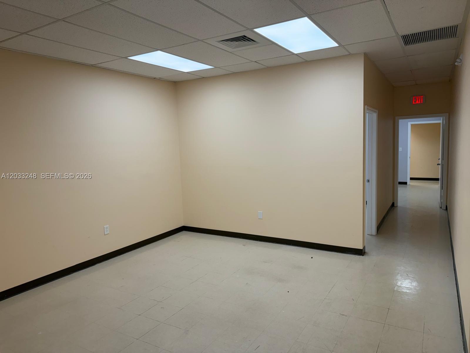 Excellent retail/professional office opportunity in a well-established neighborhood shopping center. This versatile commercial space features a welcoming reception area, multiple private offices, ADA-compliant restroom, kitchenette, central air conditioning, updated lighting, and a rear emergency exit. Large storefront windows provide excellent visibility and natural light. Located in a high-traffic retail center with ample parking and strong surrounding demographics. Ideal for medical, wellness, therapy, insurance, real estate, accounting, tutoring, or professional office use. Convenient access to major roadways and surrounding residential communities. Available for immediate occupancy.