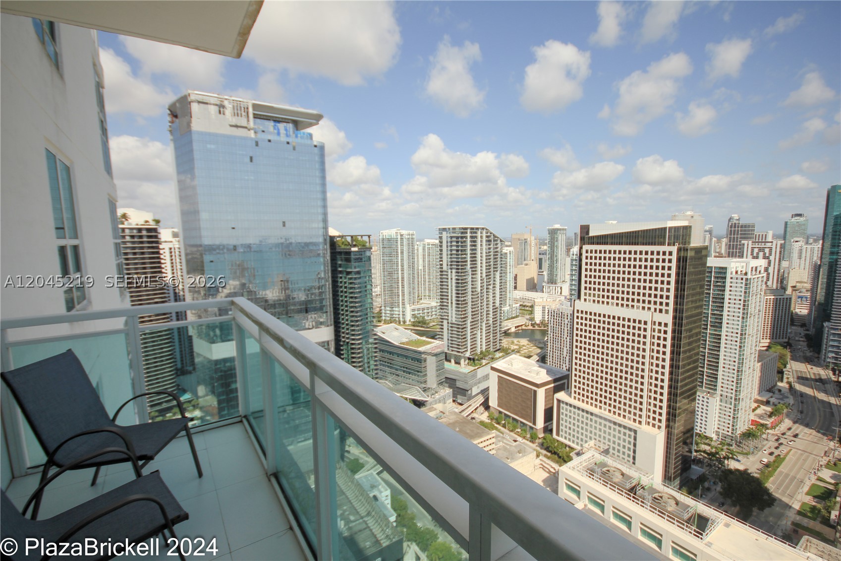 THE PLAZA 851 BRICKELL CO - Residential Lease