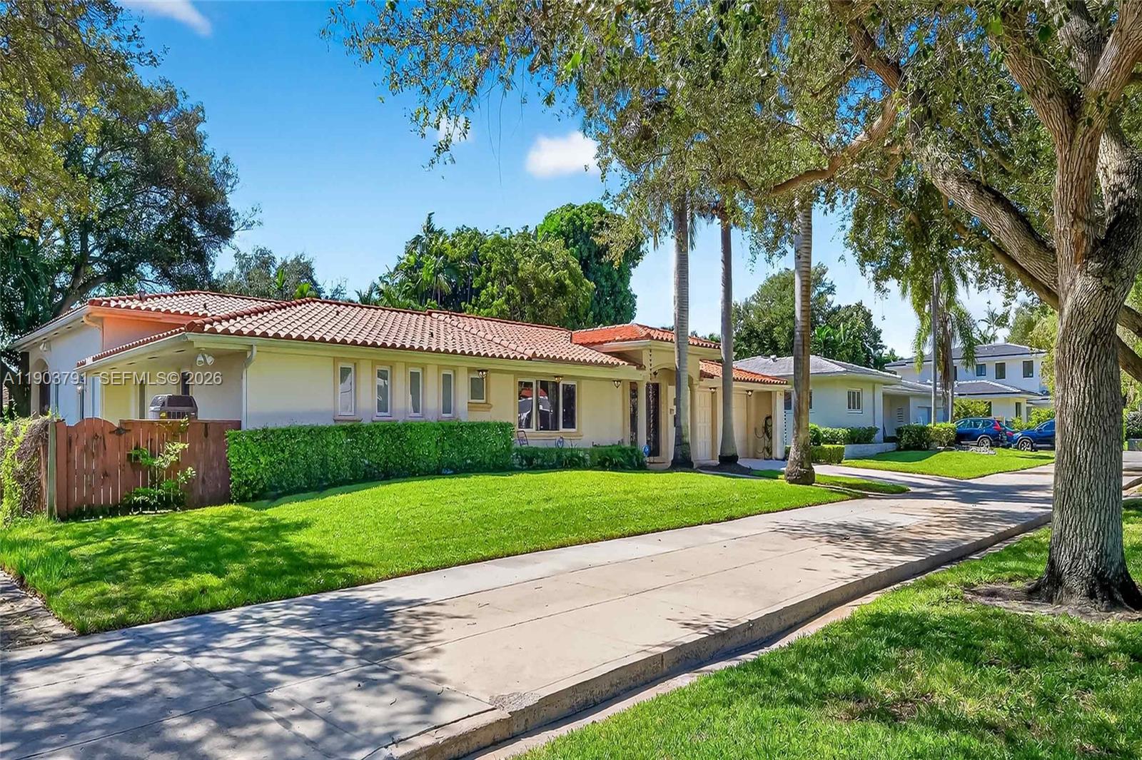 New to market at $2,770,000. Spacious 4-bedroom, 3.5-bath home on a quiet, tree-lined street in Miami Shores. High ceilings and a dramatic oversized living area offer open flow and defined spaces for relaxing or entertaining. The expansive chef’s kitchen overlooks the pool and backyard with exceptional storage, generous prep space, casual seating, gas range. The primary suite features two walk-in closets and a spa-style bath with Italian stone walk-in shower with built-in seating, double vanities, and private water closet. Seven walk-in closets throughout, six with Elfa systems, provide abundant storage. Enjoy a heated salt-chlorinated pool, large covered outdoor entertaining area, spacious laundry room with cabinetry. All impact windows and doors, updated plumbing and electrical, natural gas, and two gas tankless water heaters, three Trane AC systems, full-house Generac generator, security with cameras and video entry. Attached 1.5-car garage, and ample double driveway parking.  Images may be virtually staged and/or digitally enhanced (furniture, colors, fixtures, landscaping) for illustrative purposes only.