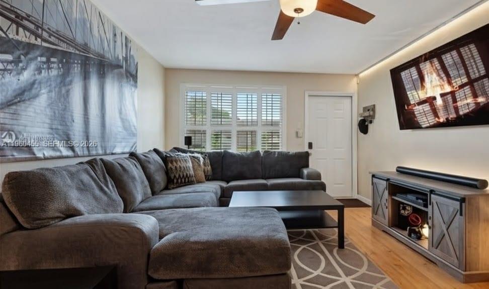 Great for investors of live in the heart of Davie in this beautifully maintained 2-bedroom, 2-bath single-story townhome in the desirable Arrowhead community. This charming home features wood floors, plantation shutters, a bright eat-in kitchen, full-size washer and dryer, and both a screened-in patio and an additional outdoor patio for relaxing or entertaining. Fiber-optic internet and smart-home features add modern convenience, and accordion hurricane shutters offer extra peace of mind. The perfect blend of comfort, convenience, and location. Near Nova University, I-595, I-75, FLL Airport, and Sawgrass Mills. Easy to show. Tenant occupied.