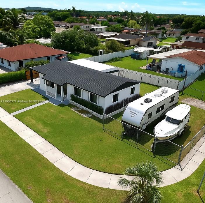 SINGLE FAMILY HOME. 4 BD / 2 BTH - 1 CARPORT/TERRACE - LARGE LOT - NO HOA - 1700 sq ft. TOTALLY REMODELED HOME CORNER LOT HOME. 2 PRIVATE SEPERATE ENTRANCES. LAUNDRY ROOM - NEW: IMPACT WINDOWS & DOORS- ROOF - KITCHEN - BATHS - FLOORING - APPLIANCES - BASEBOARDS - WINDOWSILLS - FIXTURES - MODERN BLINDS THROUGHOUT ENTIRE HOME - LIGHTING - A MUST SEE, PARK OUR RV, BOAT, SEMI TRUCK. HOME CORNER LOT. NEEDS NOTHING. READY TO MOVE IN. ALL THE HARD WORK HAS BEEN DONE. SHORT TERM LEASES LESS THAN 1 YEAR AVAILABLE TOO. EASY TO SHOW !