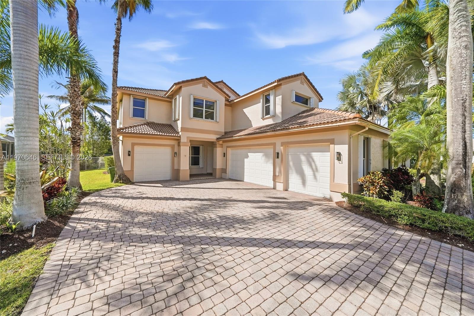 Beautiful REMODELED 6 bedrooms, 5 bathrooms and 4 car garage house located at the prestigious community of Weston Hills Country Club. Come and enjoy the astonishing sunsets from the pool side, while viewing the peaceful canal. Fenced backyard. Top of the line finishes all around the home, starting from its modern kitchen with all new cabinets, calacatta quartz countertops and stainless-steel appliances. Modern ceramic tiles all throughout the first floor and stairs, plus laminated floors upstairs. Contemporary bathrooms. Built in closet plus laundry room upstairs. This community offers a variety of amenities, including a golf course, tennis courts, a clubhouse, and a community pool. Weston Hills is also home to some of the best schools in Broward County. MOTIVATED SELLER!