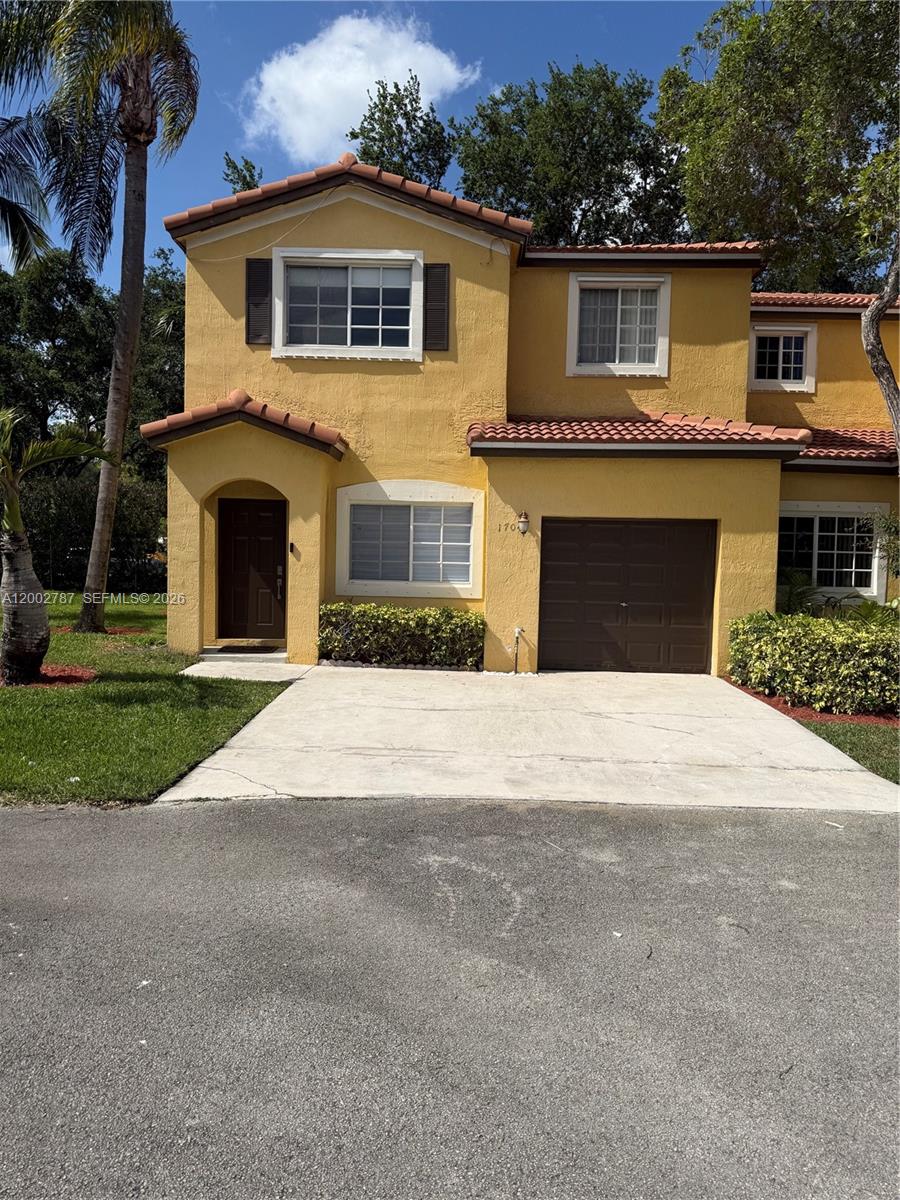 Welcome to the desirable gated Avalon Community of Miramar! This is a gorgeous and beautiful updated corner lot, a 4-bedroom, 2.5-bath townhome. The townhome comes with a NEW A/C (2025), NEW Laminate flooring (2026), a modern kitchen with quartz countertops, upgraded bathrooms, Stainless steel appliances, Zebra blinds, Roof replaced by the HOA in 2019, and a paved backyard patio. Includes a 1-car garage, 2-car driveway, and ample guest parking. The community offers 24/7 security, 3 community pools, playground, and a pet-friendly environment. Low HOA fee that covers roof maintenance, exterior paint, pressure washing, and lawn service. Enjoy living in a secure, peaceful community close to major highways, top-rated schools, hospitals, parks, malls, restaurants, and shopping centers. This townhome truly has it all: comfort, style, and perfect location!