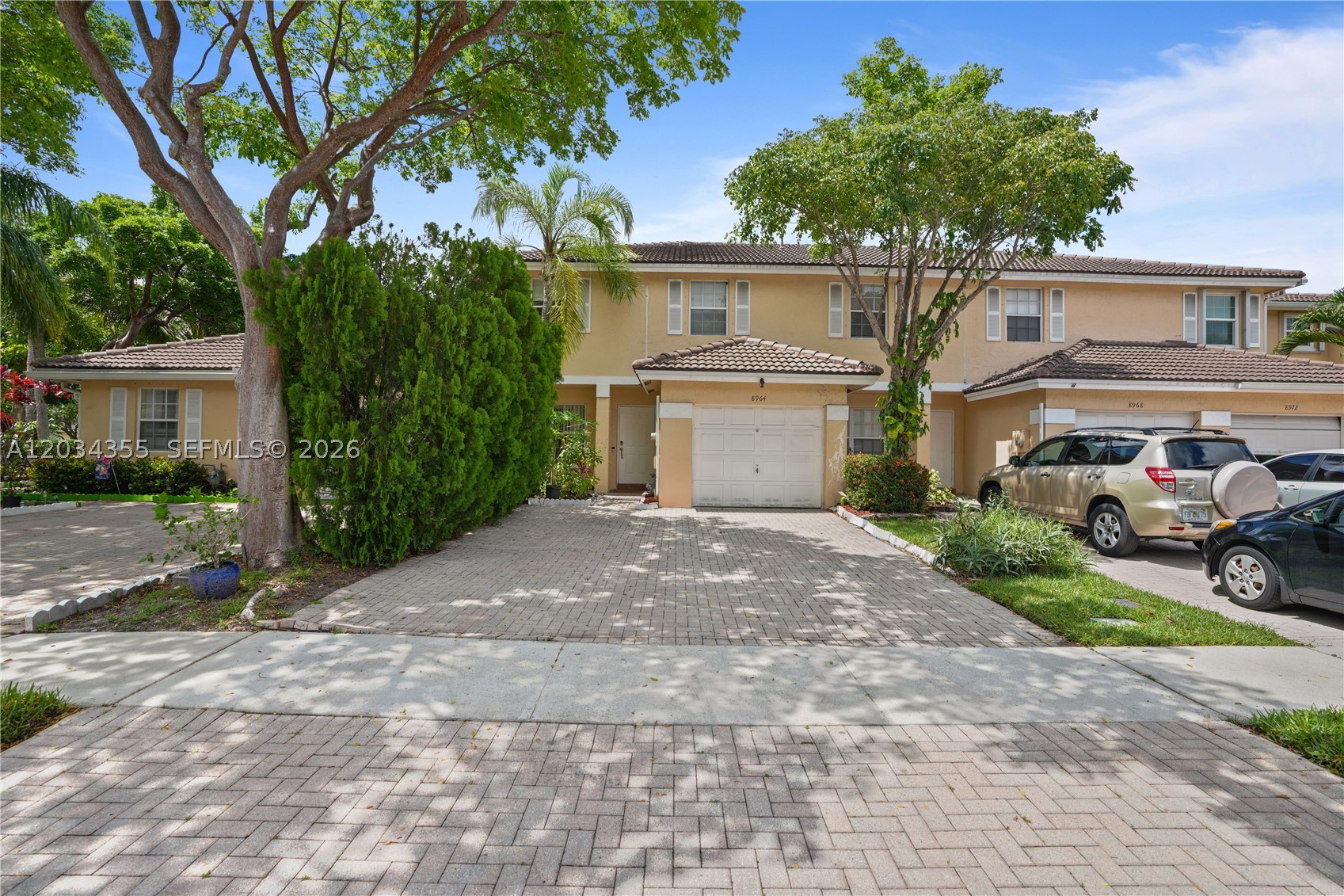 Seller offering $10,000 toward buyer’s closing costs! Welcome to this spacious 4-bedroom, 2.5-bath townhouse in the gated community of Tradewinds/Raintree Villas in Sunrise. With 2,220 sq ft of living space, this home features a private paver patio. a half bathroom downstairs, all bedrooms upstairs, a walk-in closet in the primary suite, upstairs laundry, and hurricane panels. Major updates include a new A/C (2026) and roof (2022), both bathrooms are newly renovated, and fresh paint throughout the entire home. Enjoy low HOA fees of just $277/month, including gated entry, community pool, lakes, and playground access. Conveniently located near shopping, dining, schools, and major highways. Don't miss this incredible opportunity!