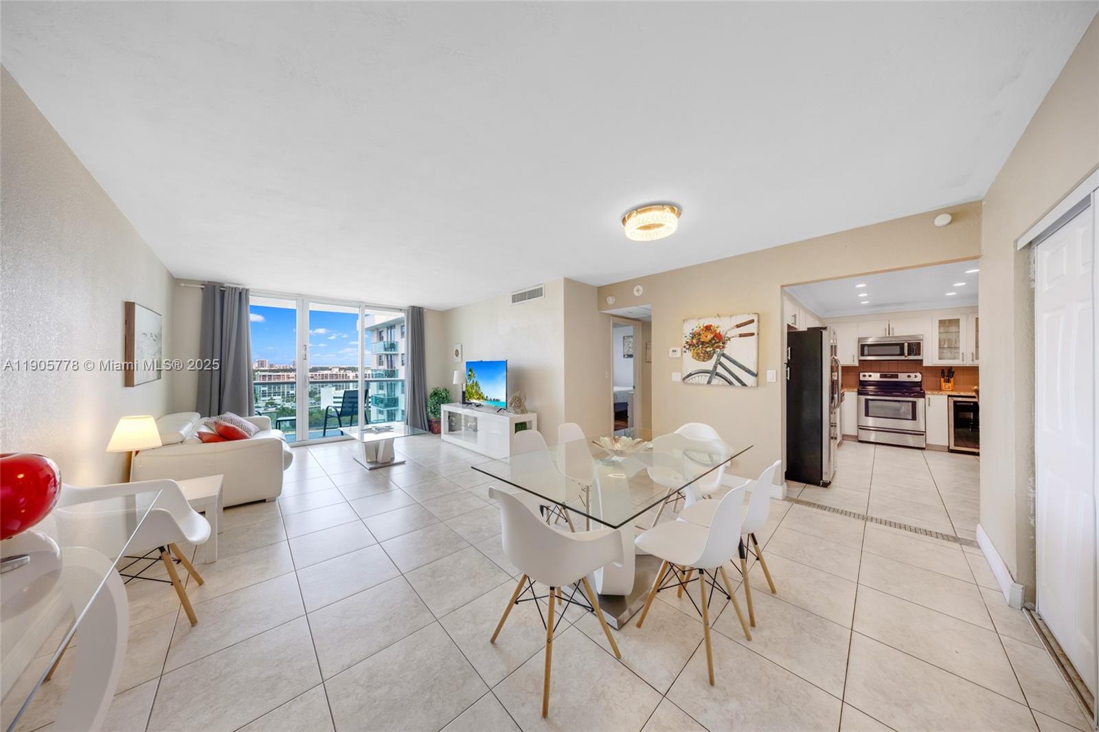 Welcome to your dream condo at Tides on Hollywood Beach!   This stunning 1 bed/1 bath unit comes complete with a 1 car garage, granite counters, and stainless steel appliances. Enjoy the breathtaking views of the canal from your open balcony, perfect for sipping your morning coffee or watching the sunset. No rental restrictions. Direct access to a wide sandy beach. Tides Building offering amenities: 2 pools, solariums, gym, business center, bar, 24hs security /valet /concierge. Don't miss out on this opportunity to own a piece of paradise in one of the most sought-after locations in Hollywood Beach.