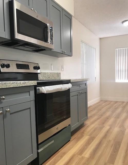 Beautiful and Bright Updated Condo 1BR/1BA, 855 sq.ft, second floor at the peaceful Summerbreeze Community at Sunrise. New flooring throughout.New Kitchen Cabinets with Granite Counter tops and Brand New Kitchen Appliances! Washer and dryer inside the unit. Lakefront balcony. Large walk-in closet. New Water Heater and more! "A" FCAT school (a block away).Clubhouse with amenities as: Swimming pool, Jacuzzi, Lighted tennis court and Basketball court, Indoor racquetball court, fitness center).Great Location at Sunrise just minutes away from Sawgrass Mills, BB&T Center, Sawgrass Expressway. One assigned parking space, plenty guest parking space