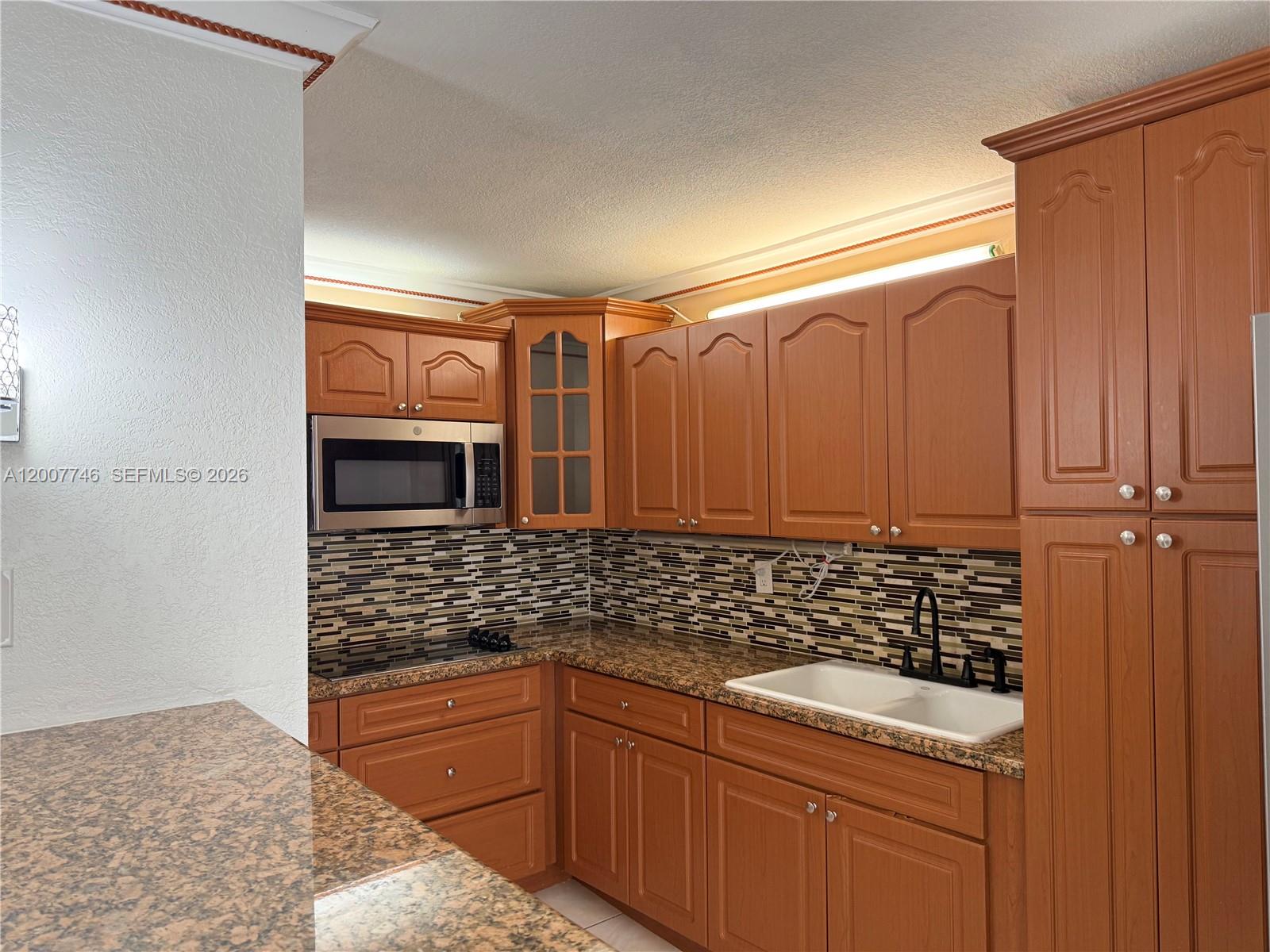 PALM-EAST GARDENS CONDO - Residential
