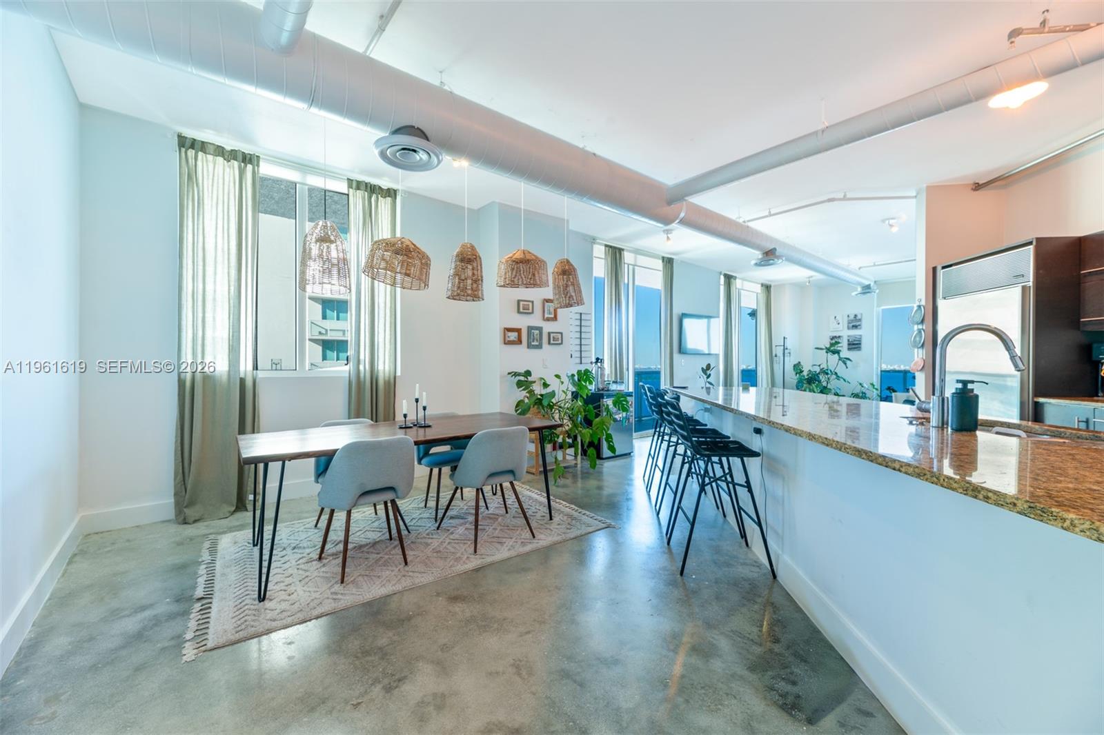 Discover the exquisite Star Lofts Residence 1603, nestled in the vibrant Edgewater neighborhood of Miami. Step onto the impressive wrap-around balcony where nearly 1k SqFt of unobstructed panoramic views of the Biscayne Bay, Atlantic Ocean, and the Miami skyline. Inside, you’ll find a spacious and inviting 1,382 SF, 2b/2ba open floor plan, an oversized kitchen and an expansive main bedroom suite. Its loft-styled design boasts 10-foot ceilings, exposed AC ducts & conduits. Star Lofts is a charming boutique building w/only three units per floor, It is also exceptionally pet-friendly, complete with its very own dog park on the 7th floor. Other amenities that Star Lofts has to offer, including a newly renovated infinity-edge pool, an elegant lobby, a fully equipped gym, and convenient storage and bike rooms