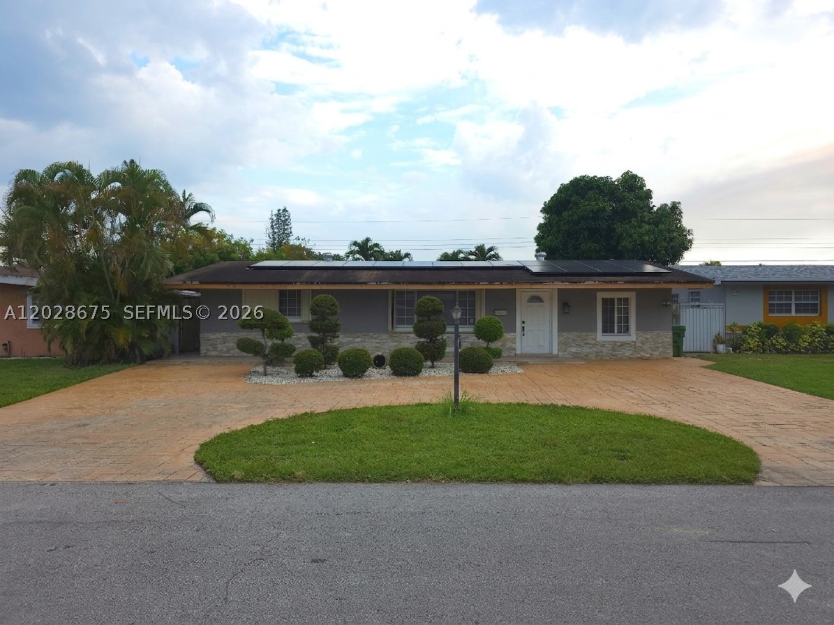 Welcome home to this beautifully maintained 3bed 2bath residence nestled in the heart of Pembroke Pines. From the moment you arrive, you'll appreciate the charming curb appeal featuring an expansive circular driveway, manicured landscaping, and inviting outdoor spaces perfect for relaxing or entertaining. Inside, enjoy comfortable living with an updated kitchen and bathrooms, a functional layout, and plenty of natural light throughout. You'll appreciate being just minutes from great shopping and dining experiences at Pembroke Lakes Mall and The Shops at Pembroke Gardens, with countless restaurants, cafés, and entertainment options. Outdoor enthusiasts will love the close proximity to local parks and recreational facilities like CB Smith Park, while commuters will benefit from easy access to major highways. This is more than a house, it's a place to create lasting memories and enjoy everything Pembroke Pines has to offer.