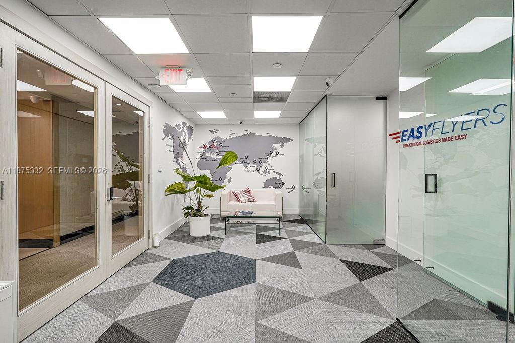 WELCOME TO A COMPLETELY REMODELED, TURNKEY CORNER OFFICE SUITE IN THE HEART OF BRICKELL ON PRESTIGIOUS BRICKELL AVENUE. THIS NEAR-PENTHOUSE, 7TH FLOOR SPACE OFFERS APPROXIMATELY 6,337 SQUARE FEET AND ESSENTIALLY ENCOMPASSES THE ENTIRE FLOOR, MAKING IT ONE OF THE LARGEST AND MOST EXCLUSIVE OFFICE OPPORTUNITIES IN THE BUILDING. FLOOR-TO-CEILING GLASS SURROUNDS THE SUITE, CREATING A BRIGHT, OPEN, AND ULTRA-MODERN ENVIRONMENT WITH CITY VIEWS FROM EVERY ANGLE. SLEEK, HIGH-END CARPETING ADDS A POLISHED PROFESSIONAL FINISH. THE EXPANSIVE BULLPEN AREA ACCOMMODATES A LARGE TEAM WITH EASE, WHILE FOUR EXTREMELY PRIVATE, OVERSIZED EXECUTIVE OFFICES PROVIDE QUIET, COMMANDING SPACES FOR LEADERSHIP. NEARLY TEN ADDITIONAL PRIVATE OFFICES LINE THE WINDOWS, FILLED WITH NATURAL LIGHT. A WELCOMING RECEPTION AREA AND FULL KITCHEN COMPLETE THE LAYOUT. RESTROOMS ARE CONVENIENTLY LOCATED ON THE SAME FLOOR. IDEAL FOR A LAW FIRM OR ANY PROFESSIONAL FIRM READY TO ESTABLISH A DOMINANT PRESENCE IN MIAMI’S PREMIER FINANCIAL DISTRICT.