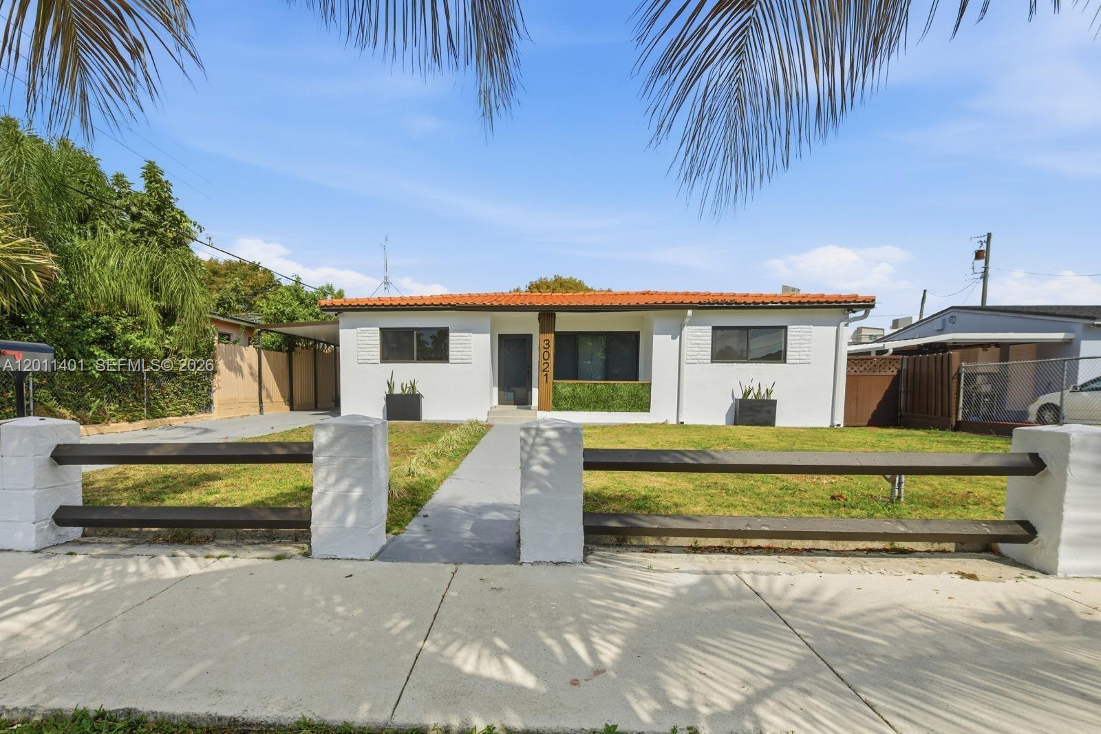 A Rare Blend of Design, Light & Location in the Heart of Coral Ridge Step into a home that immediately feels different. Clean architectural lines, abundant natural light, and a seamless open layout create a space that feels both elevated and inviting from the moment you walk in. The living areas flow effortlessly, offering the perfect balance between modern design and everyday comfort. Impact windows and doors enhance both style and peace of mind, while the thoughtfully designed kitchen serves as the heart of the home, featuring custom cabinetry, sleek finishes, and a layout ideal for gathering and entertaining. The bedrooms offer comfort and privacy, and the bathrooms are finished with refined tilework and contemporary details that feel fresh yet timeless. A standout feature of this property is the detached room at the rear, complete with its own private entrance and electricity. This versatile space offers exceptional flexibility, ideal for a home office, guest quarters, fitness studio, etc. The separate access provides privacy and independence, making it a rare and valuable addition. The spacious backyard allows room to create your own private retreat. Located just minutes from Coral Gables, Brickell, Coconut Grove, and major highways, this home combines central convenience with residential charm. Homes that offer this level of design, flexibility, and location do not last. Schedule your private showing today