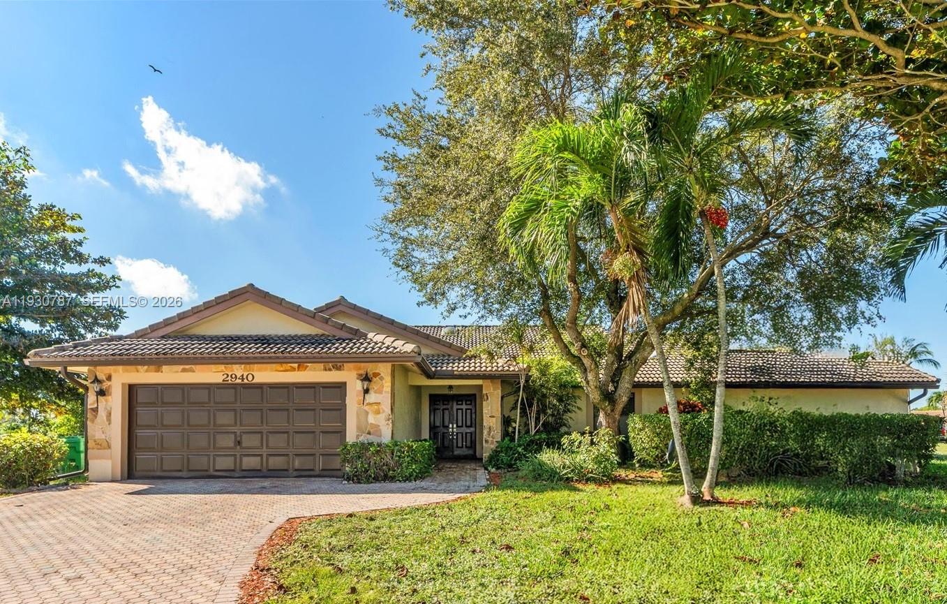 NO HOA - Welcome to the highly desirable Coral Springs Country Club! Tucked away in a secluded cul-de-sac on an impressive .41-acre lot, this home offers the ultimate freedom with NO HOA. The expansive grounds give you the flexibility to tailor the space exactly to your vision. Arrive via an expansive paver driveway that provides ample guest parking in addition to the spacious 2-car garage.  

Step inside to discover a bright and airy interior featuring beautiful tile floor, soaring vaulted ceilings and natural light streaming through the skylights. Enjoy peace of mind with major recent updates, including a 2023 electrical panel and a 2022 water heater. The primary suite is a true retreat, boasting a newly remodeled shower and a luxurious Roman tub—perfect for relaxing and melting your stress away.  

The outdoor living space is a true showstopper. Dive into the sparkling pool, which was recently upgraded with a Diamond Brite resurface. Just steps away, unwind in the hot tub, featuring evening ambiance lighting—perfect for relaxing rain or shine. 

Seller Concessions available for discussion.