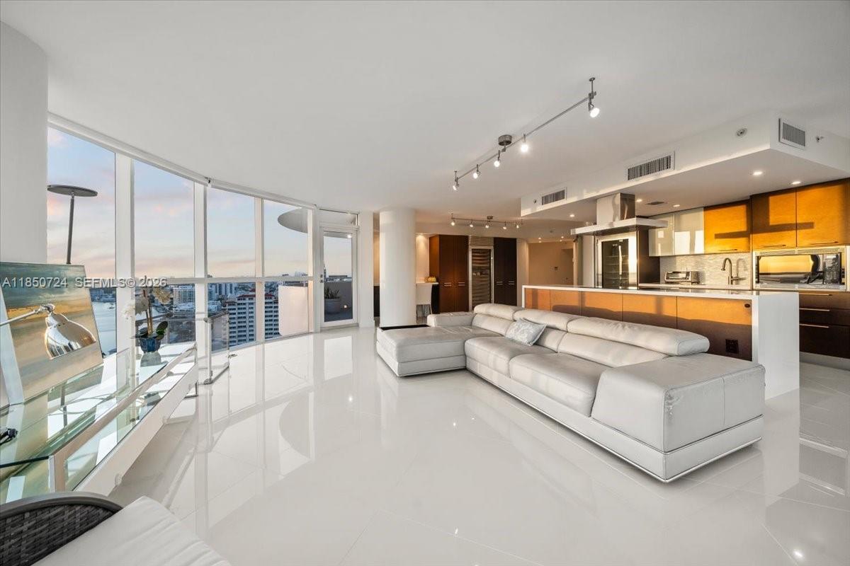 This high-floor residence at La Gorce Palace offers one of the most captivating views in Miami Beach—an endless panorama where the deep blue ocean meets the open sky. Floor-to-ceiling windows showcase stunning sunrises, sunsets, and Intracoastal views from every room. The oversized balcony invites outdoor relaxation in a serene beachfront setting. Freshly painted and filled with natural light, the unit features high-end appliances and a perfect blend of elegance and comfort. A true oceanfront retreat in one of the most iconic buildings on Collins Avenue.