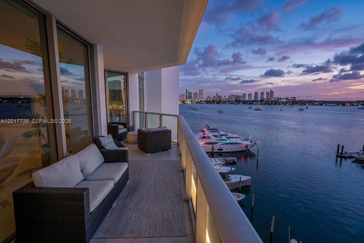 This refined, 2 bedroom residence at Marina Palms North Tower offers an elevated take on waterfront living in North Miami Beach. Featuring a desirable split floor plan, the residence is filled with natural light through floor-to-ceiling windows and opens to an ample private terrace overlooking Maule Lake,  the marina, and skyline. The living area and primary suite enjoy direct access to the balcony, enhancing the seamless indoor-outdoor living experience. The primary suite offers a spa-inspired bath with dual sinks, separate soaking tub, and shower.

Marina Palms is a full-service luxury condominium and yacht club marina offering resort-style amenities including an infinity-edge waterfront pool, children’s pool, state-of-the-art fitness center, sauna and steam rooms, club room, TV lounge, catering kitchen, business center, conference room, children’s and teen centers, valet, guard-gated entry, and 24-hour security. 

Ideally located along the waterfront in North Miami Beach, just minutes from Aventura Mall, Bal Harbour, and Sunny Isles Beach.

This unit must be purchased with a restricted boat slip at Marina Palms Yacht Club Marina. Space #095 available for purchase at an additional $325,000 (MLS A12018376) accommodates a vessel up to 60 feet in length.