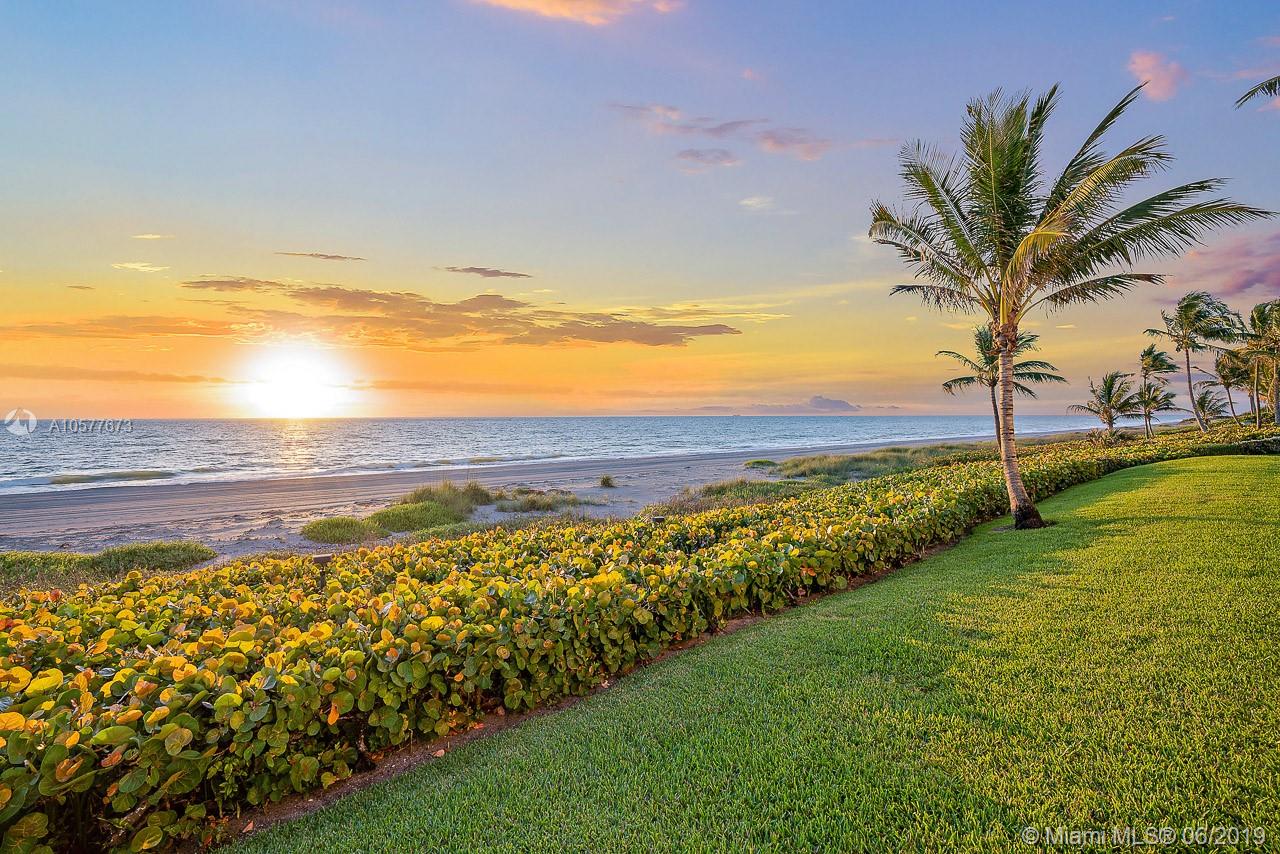 Magnificent, private family compound on almost 2 beautiful Innocenti & Webel designed landscaped acres with 225' of prime Jupiter Island oceanfront. This wonderful property includes a main house, guest cottage and fully equipped pool cabana complete with an automatic disappearing pool cover sits on a high elevation with wide, unobstructed turquoise blue water views. The main house was completely rebuilt in 2001 and features light filled rooms with spectacular views of the ocean and 4 enormous bedrooms. The large 2 bedroom guest house above the garage is almost 1100 sf. ft. and has a living and dining area and full kitchen. All this and a Jack Nicklaus designed putting green makes this a truly special Jupiter Island tropical oasis. Whole house generator and 3 propane tanks.