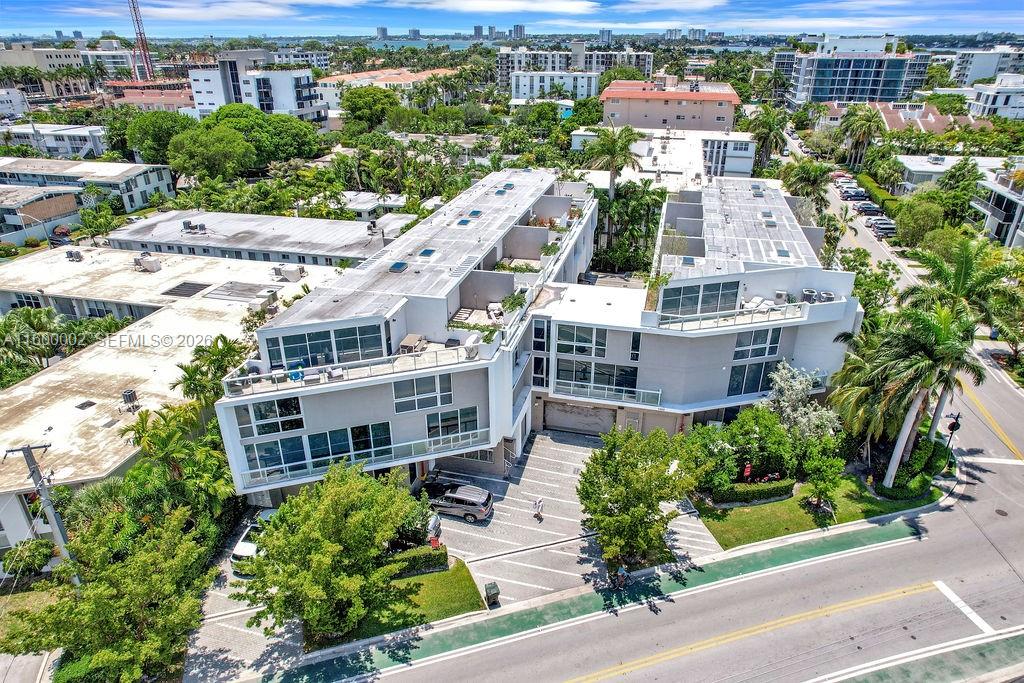 Step into the epitome of luxury with this stunning townhouse in the exclusive Bay Harbor Islands. Spanning an impressive 2,519 square feet across four stories, this property is a masterpiece of design and comfort. Each of the four bedrooms is complemented by four full bathrooms, and an additional half-bath adds convenience for entertaining. An interior elevator provides effortless access to all levels.

Conveniently located within walking distance to the renowned Bal Harbour Shops, this townhouse is just steps away from a world-class shopping experience, fine dining restaurants, cozy cafes, one of Miami-Dade's best rated schools, and various houses of worship. It’s not just a residence; it’s a lifestyle choice that offers both luxury and convenience. Unit leased until July 2026.