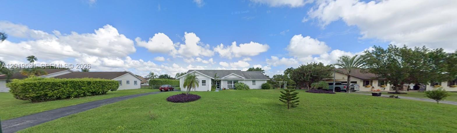 Beautifully updated 3BR 2BA pool home in desirable Westbury Estates. Situated on an oversized 27500 SF lot with room for RVs boats and additional vehicles. Features include an open split bedroom floor plan updated kitchen and bathrooms ceramic tile throughout impact windows and doors and a newer roof for added peace of mind. Backyard retreat features a heated pool relaxing zen area with gazebo outdoor shed and several fruit trees with plenty of additional space for gardens landscaping or expansion. Expansive lot offers endless possibilities for customization and future use. Surrounded by South Floridas beautiful agricultural lands while still located minutes from the ocean the Everglades and the Florida Keys. Large driveway with ample parking. Conveniently located near schools shopping dining and major highways.
