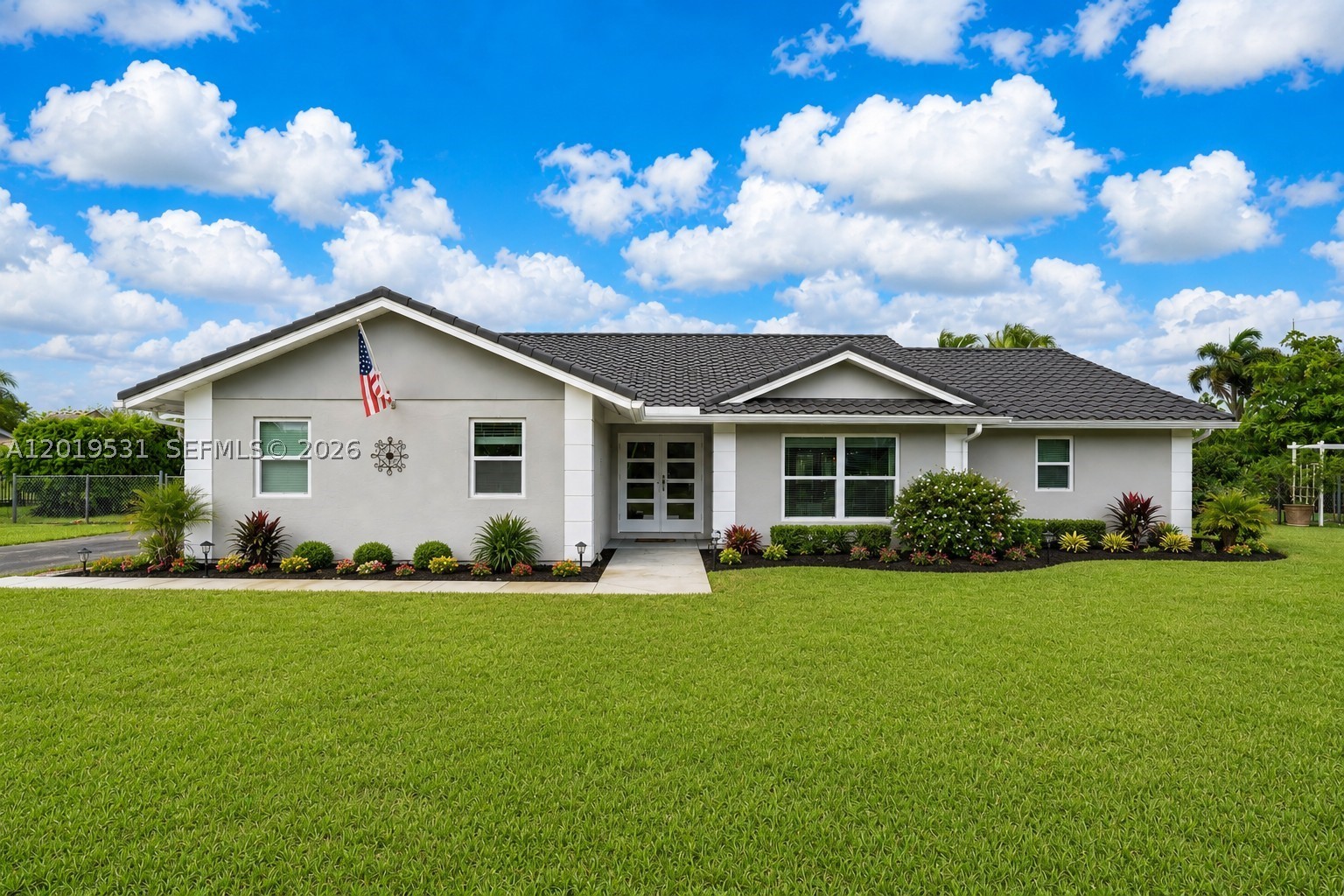 Seller is very motivated and ready to make a deal — bring your buyers! Beautifully updated 3-bedroom, 2-bath pool home on an oversized 27,500 SF lot in sought-after Westbury Estates. Plenty of room for RVs, boats, and all the toys. Inside offers an open split floor plan, renovated kitchen and baths, ceramic tile throughout, and a spacious Great Room made for gathering. Impact windows AND doors plus a newer roof mean lower insurance and real peace of mind. Step outside to your own private backyard retreat: a heated pool, a serene zen garden with gazebo, and mature fruit trees — with room to spare for gardens, expansion, or a dream workshop. Surrounded by South Florida's lush agricultural countryside, yet just minutes from the ocean, the Everglades, and the Florida Keys. Space, privacy, and freedom rarely come together like this. All reasonable offers considered — easy to show. Don't miss it!