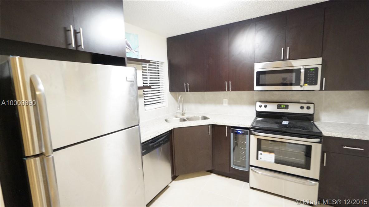 INVESTORS WELCOMED!! FORGET THE REST AND BRING YOUR PICKIEST CLIENT TO SEE THIS COMPLETELY REMODELED 1st FLOOR CORNER CONDO WITH ALMOST 1,100 SQFT OF ABSOLUTE BEAUTY AND ATTENTION TO DETAIL WITH OVER $35K IN IMPROVEMENTS.NEW KITCHEN WITH GRANITE COUNTER TOPS AND STAINLESS STEEL APPLIANCES INCLUDING WINE COOLER!CROWN MOLDING,UPDATED BATHROOMS,NEW HIGH-END PORCELAIN TILES THROUGHOUT,WASHER AND DRYER IN SEPARATE LAUNDRY/STORAGE ROOM IN SCREENED PATIO. RENT RIGHT AWAY, TURN KEY WITH HIGH INCOME POTENTIAL!!