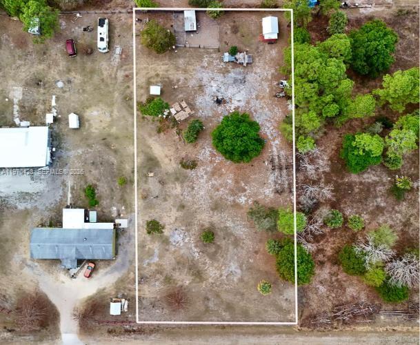 Prime 1.09-acre vacant lot located in Clewiston, FL. Enjoy the space and privacy of over an acre, perfect for building your dream home, placing a manufactured home, or holding as an investment. No HOA restrictions offer flexibility for residential or recreational use. Conveniently located with easy access to town amenities, schools, and major roadways while still offering a peaceful, rural setting. Great opportunity to own affordable land in the growing Clewiston area!