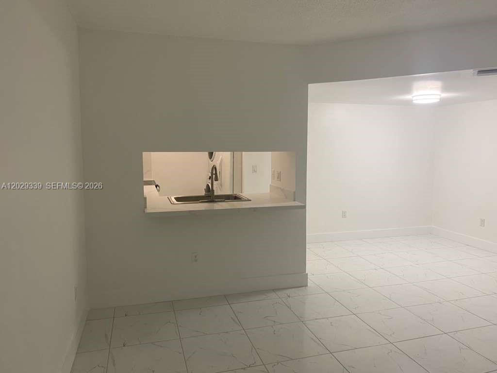 Excellent rental opportunity in the heart of West Kendall / Kendale Lakes! Located directly on Sunset Drive, this beautifully positioned 2BR/2BA condominium offers the ultimate convenience of comfortable first-floor living—meaning no stairs to navigate and seamless daily access.

The vibrant surrounding area is incredibly family-friendly and highly walkable. Parents will love being less than a mile from top-rated schools like Bowman Ashe/Doolin K-8 Academy and John A. Ferguson Senior High. Everything you need is right at your doorstep, with a fantastic variety of local restaurants, cafes, and shopping centers just minutes away. Commuting is a breeze with easy access to major roadways and nearby public transportation.

Please note: Strictly no pets allowed per owner/association regulations. Enjoy a quiet, clean, and beautifully maintained community in a prime Miami location. Don't miss out—schedule your showing today!