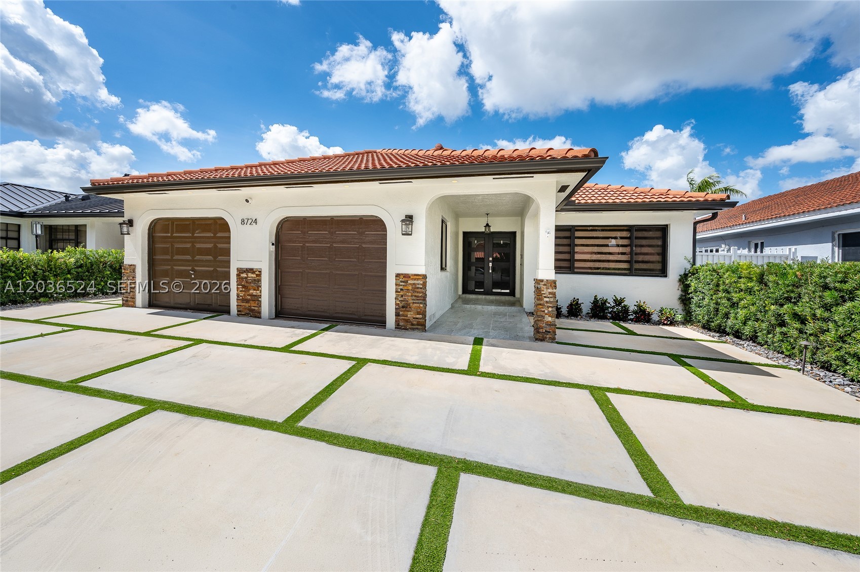 Stunning 3-bedroom, 2-bath home with a garage in the heart of Miami Lakes. This move-in-ready residence features an open-concept floor plan, impact windows and doors for year-round peace of mind, and elegant porcelain flooring throughout.The modern white kitchen is equipped with granite countertops, a center island, and stainless-steel appliances, making it perfect for both everyday living and entertaining. Vaulted ceilings enhance the spacious feel and fill the home with natural light.
The primary bedroom features stylish barn door, a custom walk-in closet, and a spacious bathroom with dual vanities. Step outside to a privately fenced backyard with a covered patio, ideal for relaxing or hosting family and friends. The oversized driveway accommodates up to six vehicles. Conveniently located between I-75 and the Florida Turnpike, just minutes from Miami Lakes Main Street, shopping, dining, parks, and top-rated schools. No HOA!