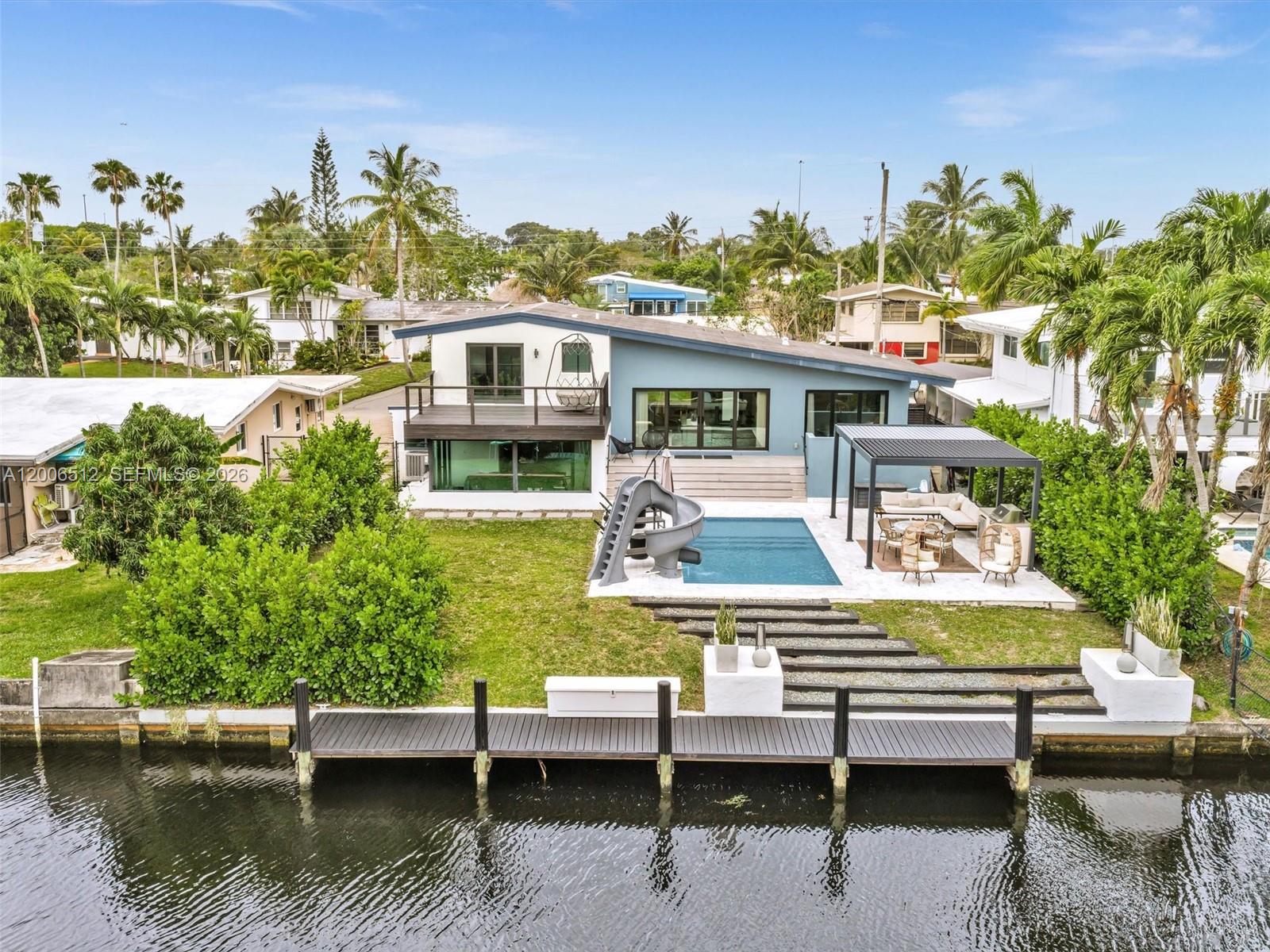 Fully remodeled waterfront residence offering direct ocean access via the New River system, combining modern living with a true South Florida boating lifestyle.

Originally built in the 1950s and completely transformed through a full-scale renovation in 2023, this 4-bedroom, 3-bath home delivers a clean, contemporary feel with seamless indoor-outdoor flow designed for everyday living and entertaining.

The property features a private dock, open water canal views, and a backyard centered around poolside living, creating a rare opportunity to enjoy waterfront living without the time, cost, or complexity of new construction.

Located in a quiet residential boating community, the home offers navigable access to the Atlantic Ocean through a continuous waterway system with no fixed bridges, connecting through the South Fork New River and Port Everglades.

This is a turnkey waterfront residence ideal for buyers seeking boating access, privacy, and modern comfort—at a level that is increasingly difficult to find in today’s market.

Private showings available.