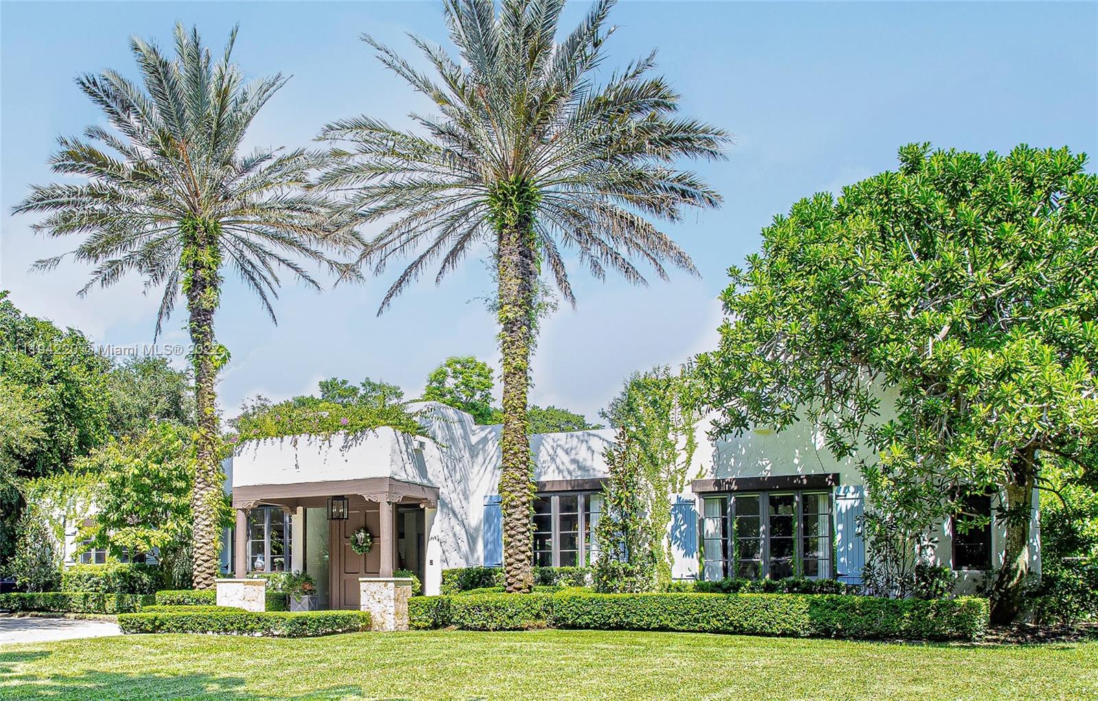 Pinecrest Paradise Perfection! This executive home was renovated with exquisite taste & attention to detail by the Designer/Owner. There are 7 beds/7 baths, which includes office w/ built-ins & a staff room. House features wood floors, a fireplace & expansive views of outdoors. Chef’s kitchen boasts white wood cabinetry & gas range, bar area. Recent addition (completed July 2021) of an impressive Owner’s Suite (additional 1203 SqFt for a total of 7147) with luxurious marble bath overlooking pool & grounds, adds to resort feel. Bedrooms have own ensuite bathroom & walk in closet. House sits on beautiful street in best school district. Impact windows & doors, state of art camera/entertainment system, wood beams & beautiful pool area add to its undeniable “Ralph Lauren hacienda style” charm.