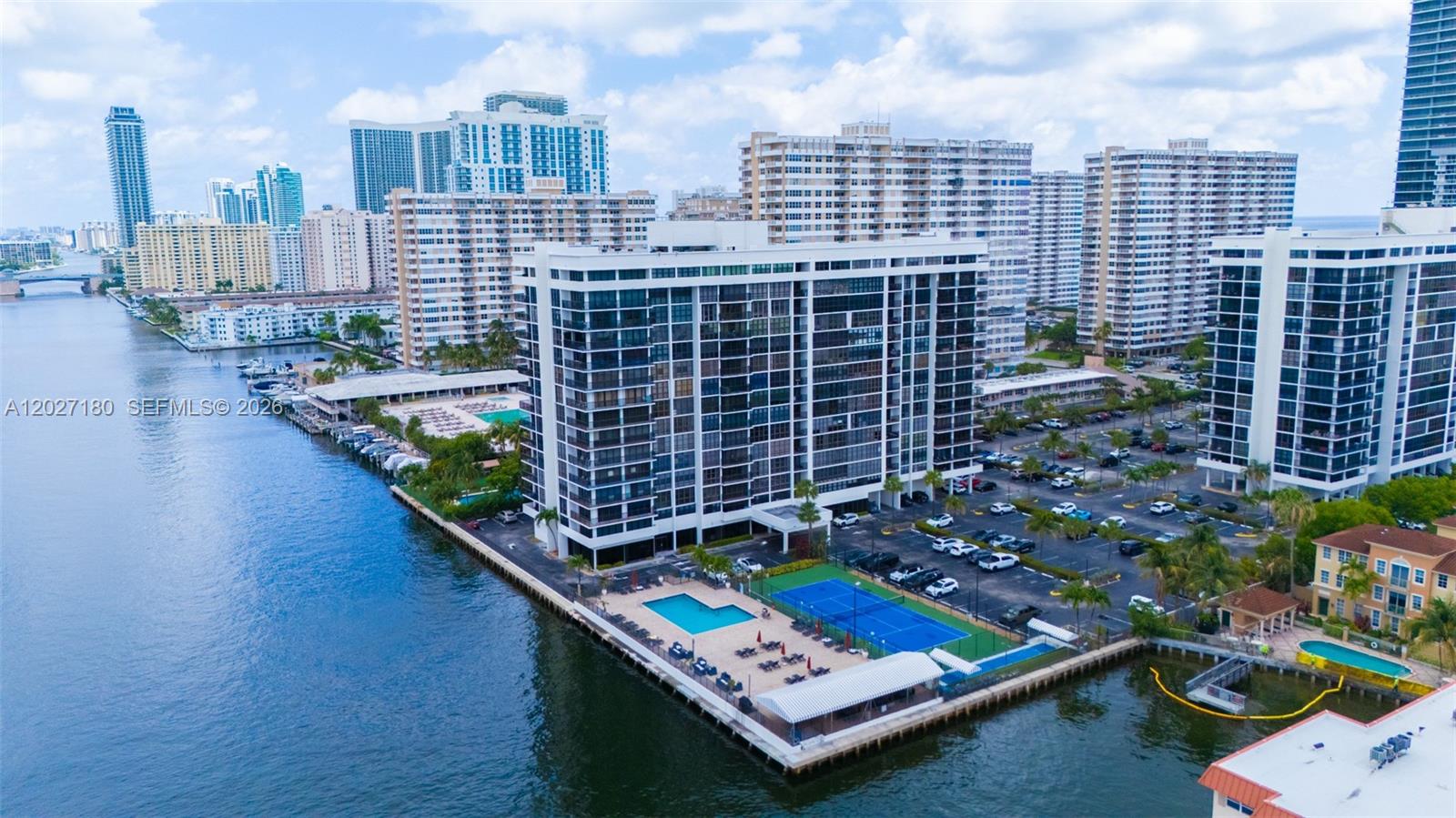 Recently updated and flooded with natural light, this stunning residence offers breathtaking ocean and canal views from every room. Featuring oversized porcelain flooring throughout and dramatic floor-to-ceiling windows, the home delivers a sleek modern feel with seamless indoor-outdoor living.
The spacious primary suite includes a private balcony, oversized walk-in closet, and spa-like ambiance. A versatile second bedroom easily functions as a guest room, home office, or den. The open-concept kitchen is equipped with stainless steel appliances, perfect for both everyday living and entertaining.
The building has recently undergone extensive upgrades including elevators, redesigned lobby, updated pool deck, tennis courts, enhanced lighting, and completion of the 50-year certification. Residents enjoy a heated pool, barbecue area, billiard room, community room, 24-hour gated security, and direct beach access just across the street.
Ideally located within walking distance to shopping, restaurants, and everyday conveniences, and just minutes from Aventura Mall.