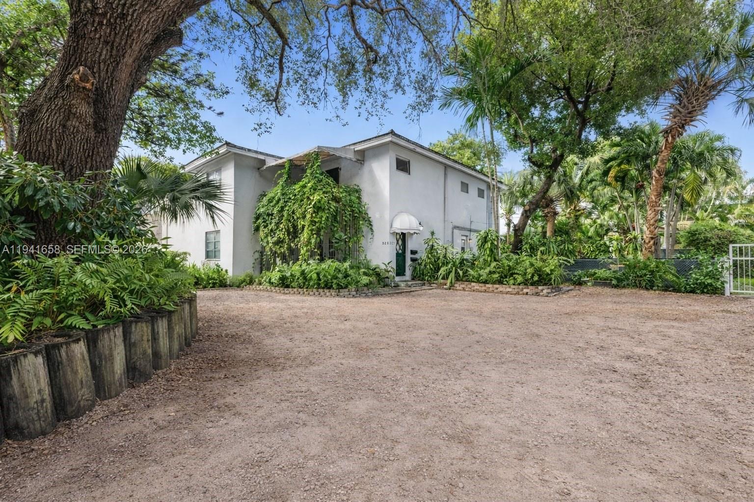 Coral Gables Duplex with Expansion Potential! Located on Bird Road, this property offers two spacious units (each 2BR/2BA) with easy potential to convert one into a 3BR layout. Ideal for investors or dual-living. Prime location near parks, schools, Merrick Park, top restaurants, and minutes from the Biltmore Hotel & Golf Club. Adjacent lot included (total 7,825 Sq.Ft), creating a rare opportunity for expansion or future development. Don’t miss this versatile investment in one of Miami’s most desirable neighborhoods!