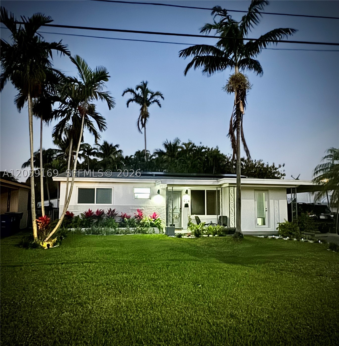 Canal-Front Florida Home | Mid-Century Character | Renovated | Turnkey

Canal views. Upgraded finishes. Zero deferred maintenance. This is the one you’ve been waiting for!
Nestled five houses from the Highland Lakes/Miami-Dade line on a private canal, 904 SW 3rd Ave delivers a rare combination of location, lifestyle, and meticulous renovation in the heart of Hallandale Beach. No HOA.

Owned solar panels (2023) - fully paid and transferring with the sale. Your FPL bill runs just $35/month. Significant savings. In South Florida, that’s a game changer.

• Complete electrical rewire (2022) + all-new lighting on dimmers
• Open-concept kitchen — bright quartz counters, expanded cabinetry, seamless flow
• Hall bath gutted to the studs — white wave tile, frameless glass shower, floating walnut vanity, matte black fixtures
• Upgraded to new 3.5 ton AC (2024) & Full impact windows and doors
• All interior doors and trim replaced and upgraded
• Wide-plank LVP flooring
• Automatic sprinkler system — lush, manicured tropical landscaping with mature royal palms
• Oversized screened Florida room — canal-facing, covered, and built for year-round living
• Gated backyard — private, secure, serene
• Covered carport
• No HOA

This location delivers: Five houses from Highland Lakes/Miami-Dade County line. East of 95 one of Hallandale’s most coveted pockets. Minutes to Aventura Mall, Brightline, and the beach. Best of both counties at your doorstep. This is not a flip.